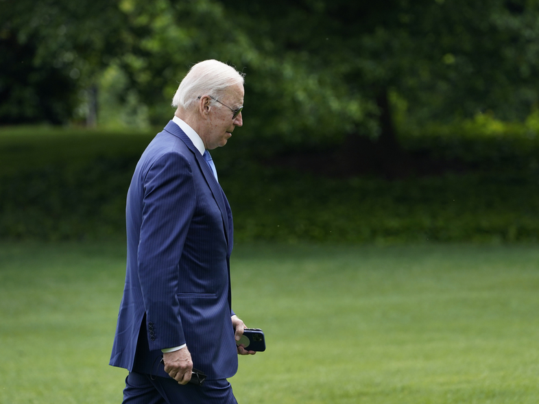 President Joe Biden heads towards the Oval Office of the White House in Washington, on Wednesday. (Susan Walsh/AP)