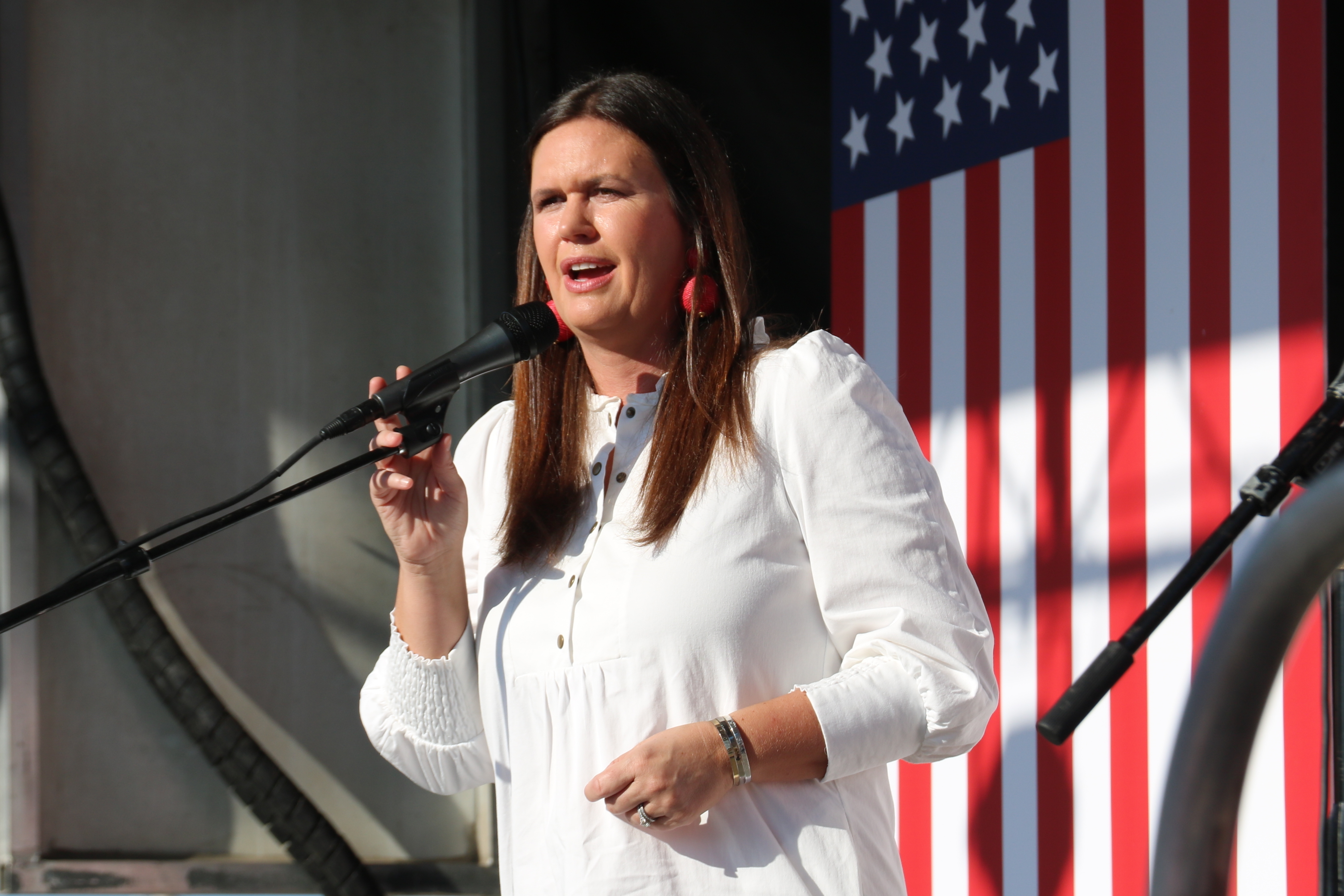 Arkansas GOP primary candidate for governor, Sarah Huckabee Sanders, speaks to a crowd of supporters on Sept. 6, 2021, in Benton, Ark., her first campaign appearance after announcing her candidacy. (KUAR)