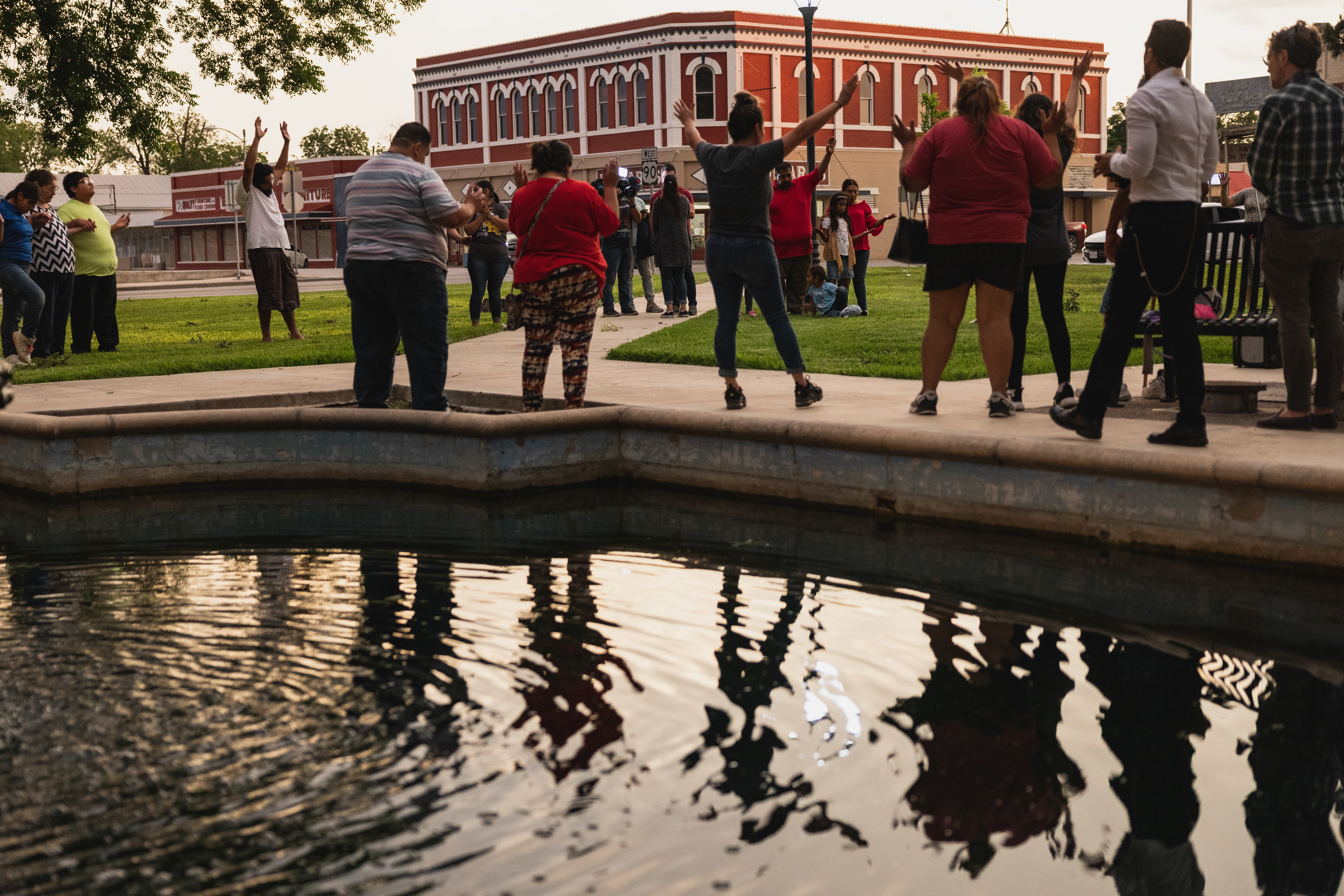 May 24: Members of the community gather at the City of Uvalde Town Square for a prayer vigil in the wake of a mass shooting at Robb Elementary School.