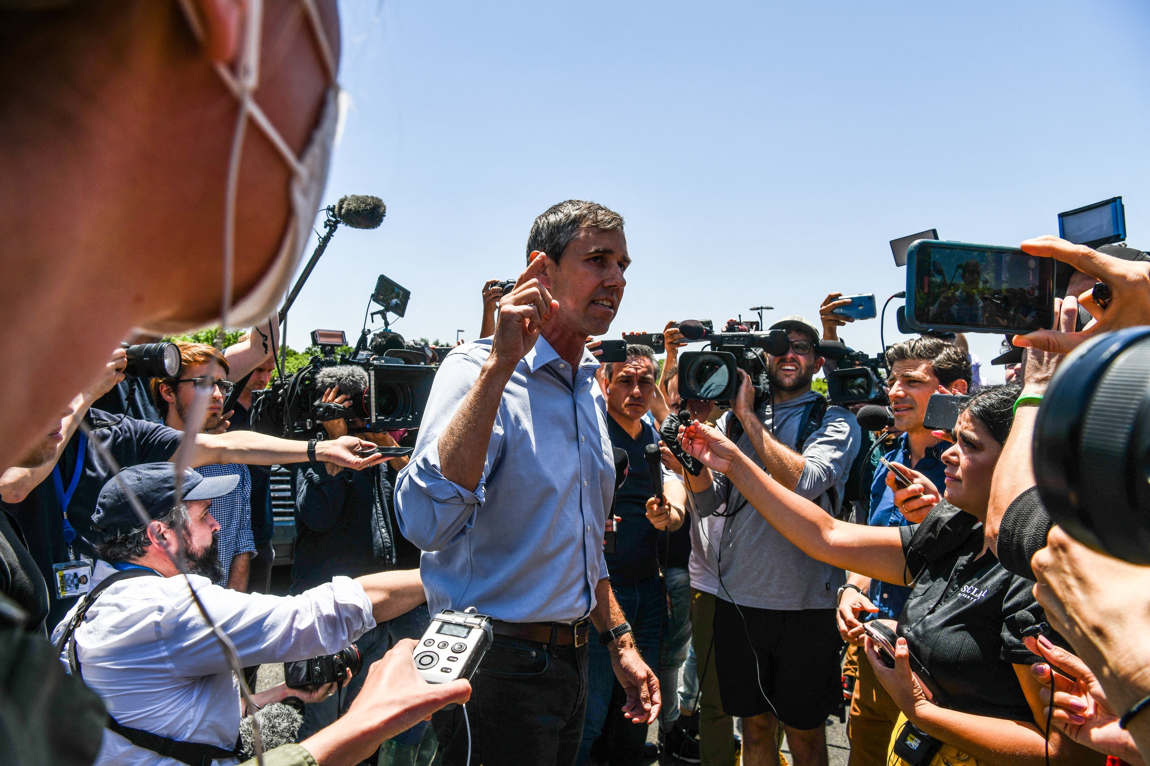 May 25: Democratic gubernatorial candidate Beto O'Rourke speaks to the media after interrupting a press conference held by Texas Gov. Greg Abbott in Uvalde, Texas.