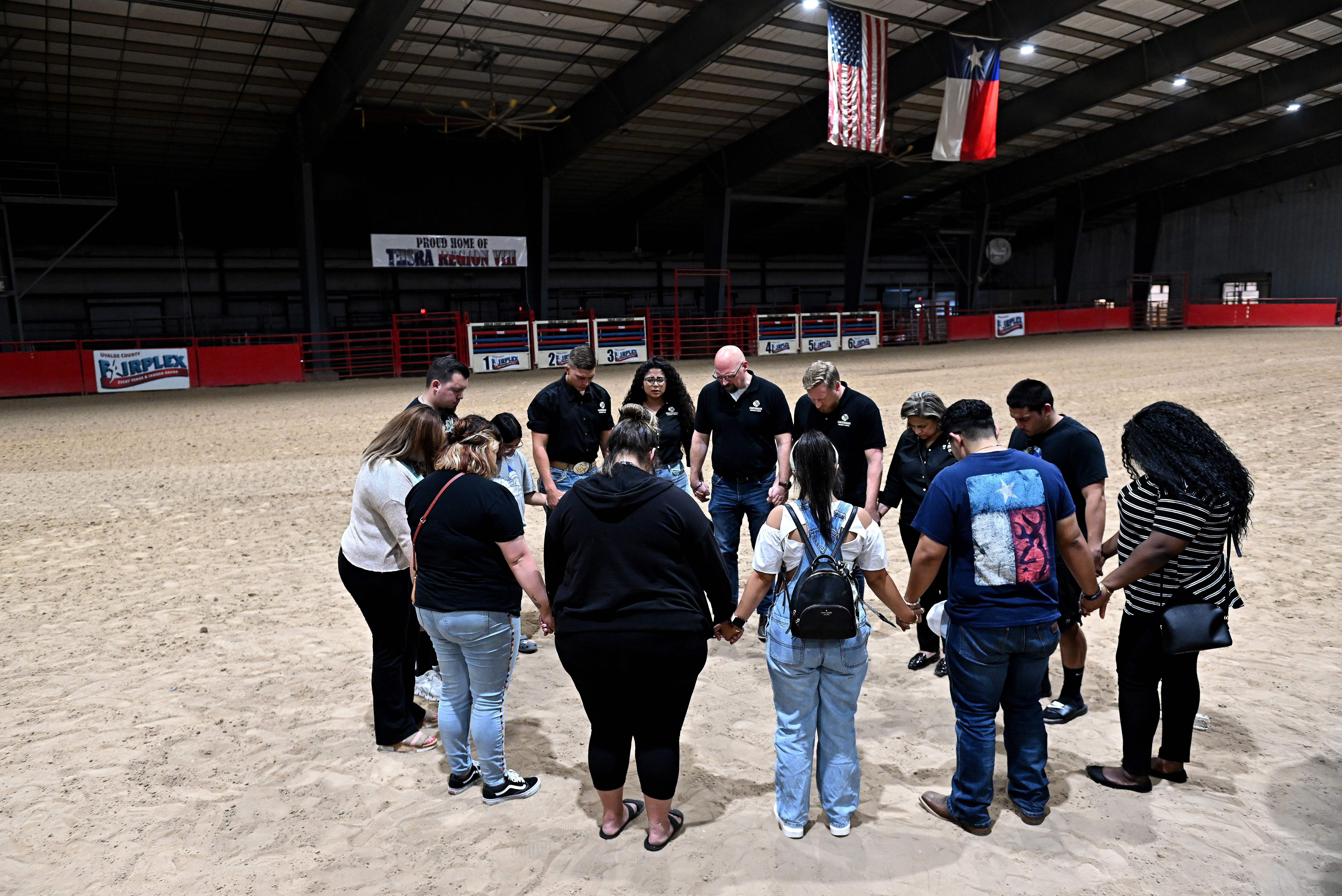 May 25: Mourners pray after a vigil to honor the victims of a mass shooting at Uvalde, Texas' Robb Elementary School on Tuesday.