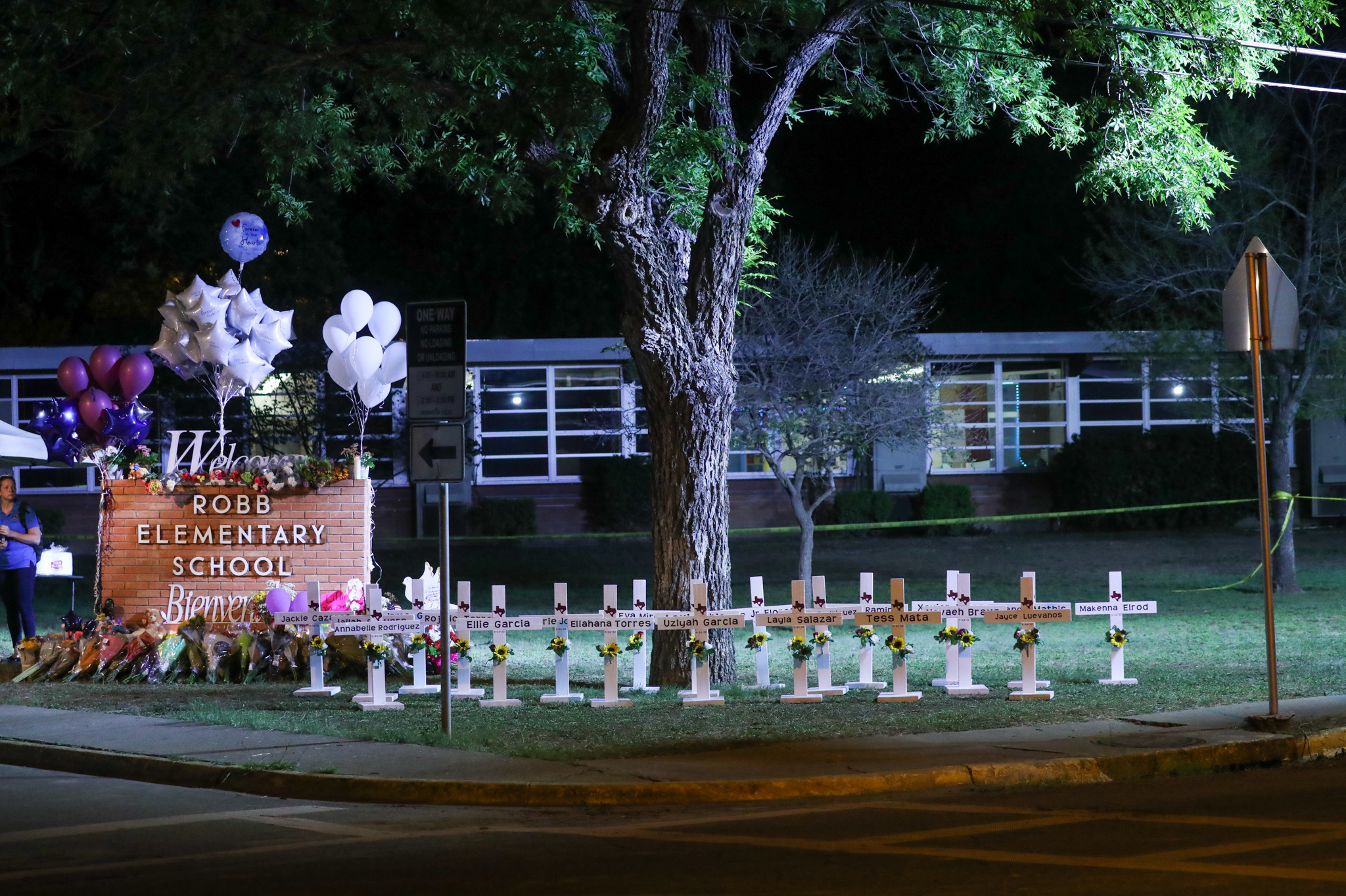 May 25: Flowers are placed on a makeshift memorial outside Robb Elementary School in Uvalde, Texas.