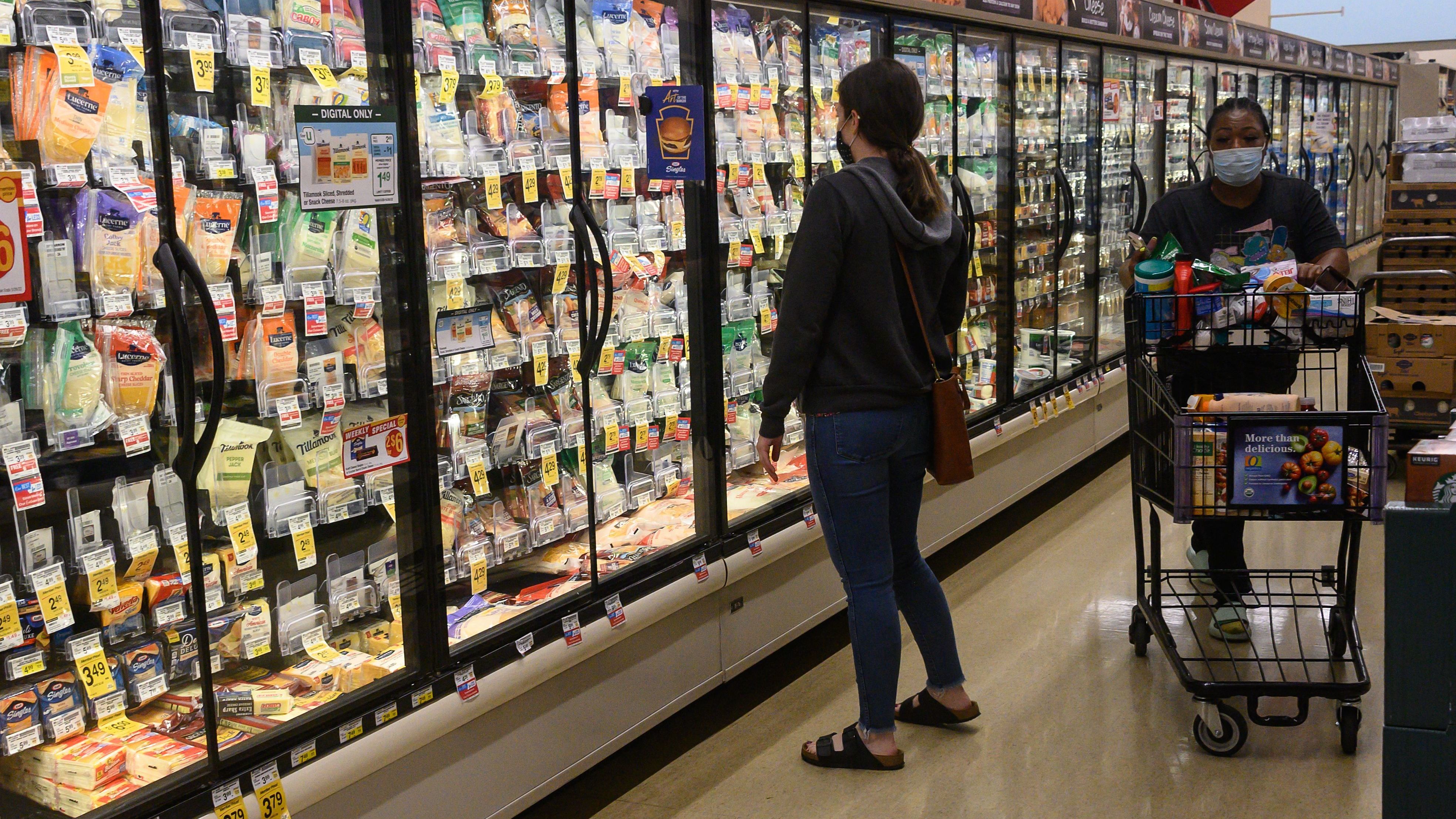 People shop in a supermarket in Washington, DC, on May 26, 2022, as Americans brace for summer sticker shock as inflation continues to grow. (AFP via Getty Images)