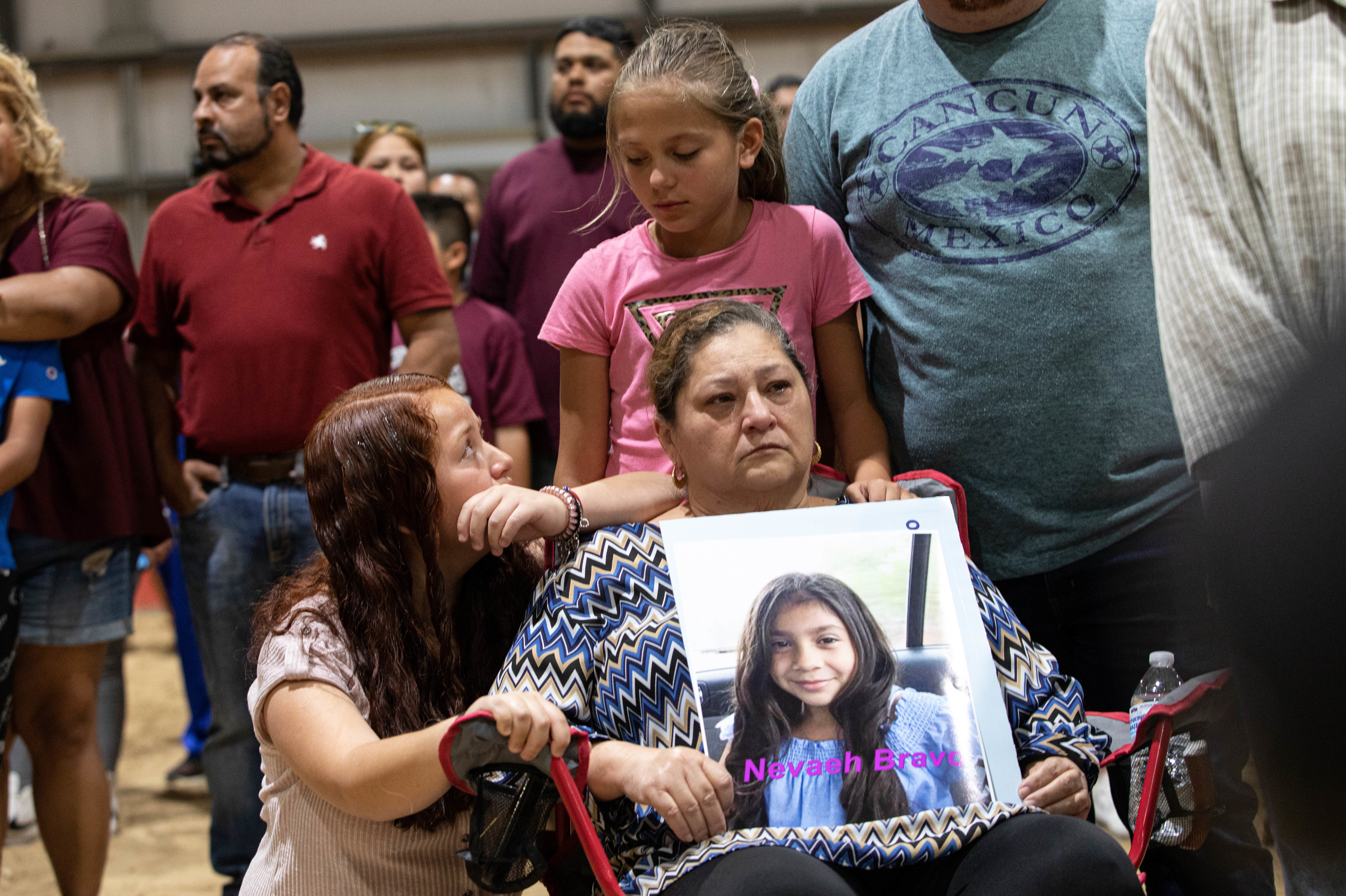 May 25: Community members attend a vigil for the 19 students and two adults killed in the mass shooting at Robb Elementary School on Tuesday.
