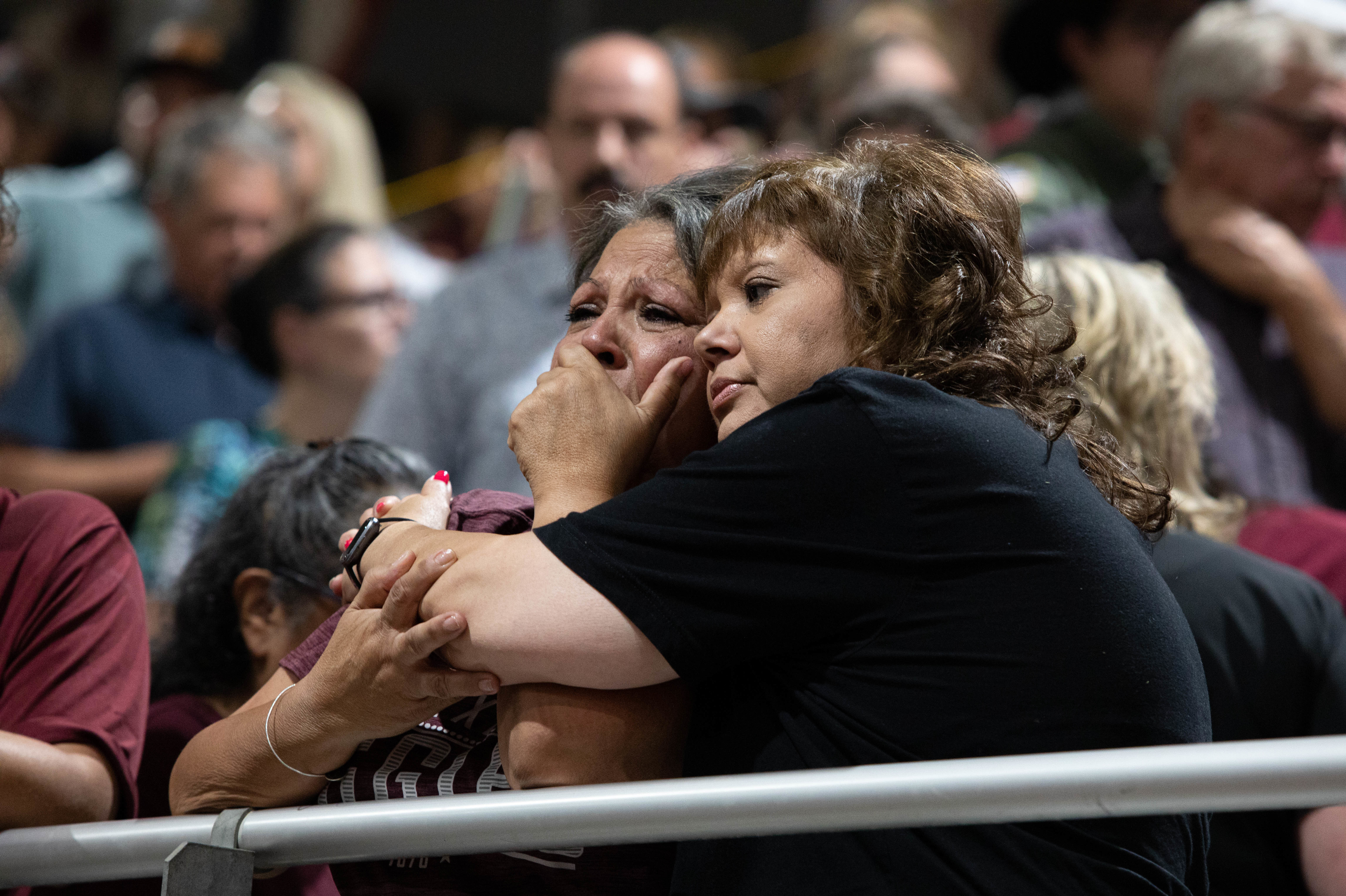 May 25: Community members mourn at a vigil for the 19 students and two adults killed in the mass shooting at Robb Elementary School on Tuesday.