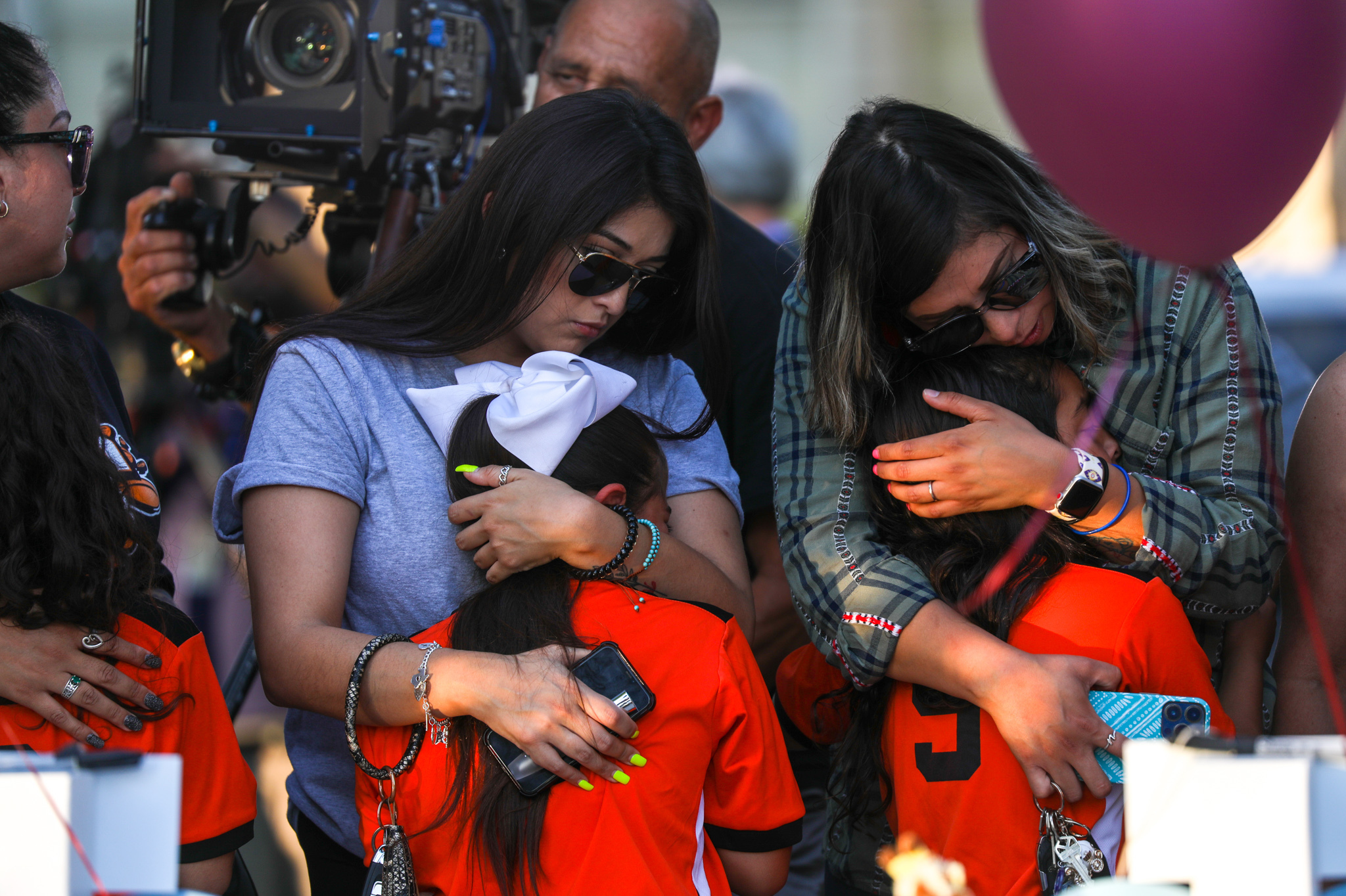 May 26: People visit memorials for victims of Tuesday's mass shooting at a Texas elementary school, in City of Uvalde Town Square.
