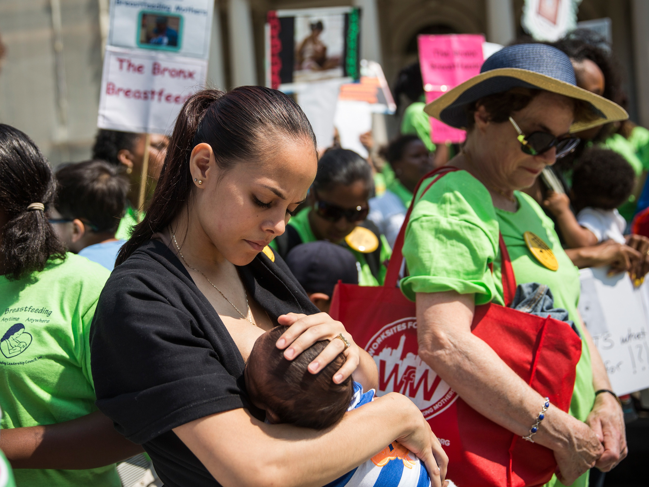 The baby-formula shortage has led some to question why the U.S. doesn't provide more support for breastfeeding. Here, a woman breastfeeds her son outside New York City Hall during a 2014 rally to support breastfeeding in public. (Getty Images)