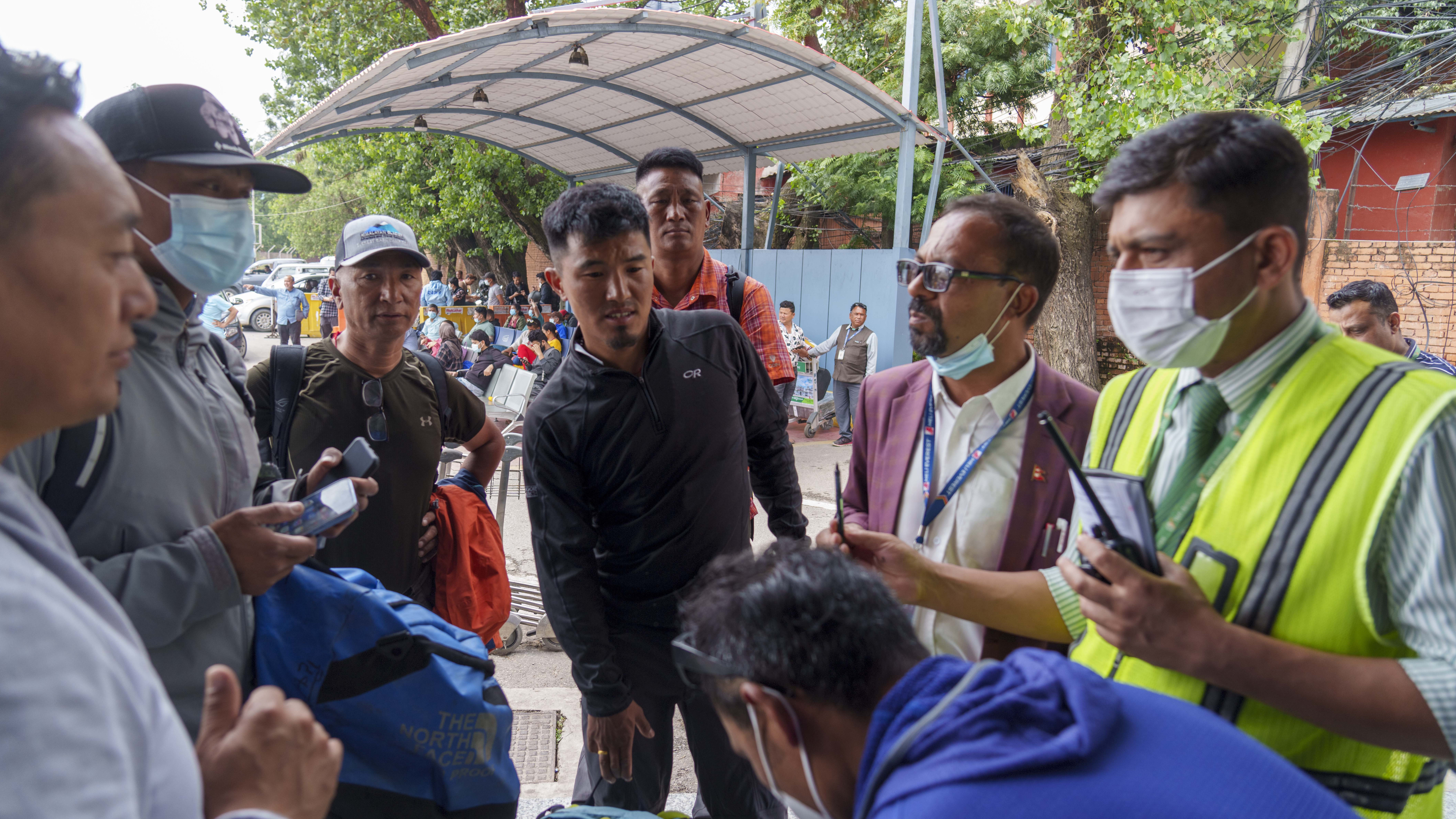 A plane carrying 22 passengers was found crashed on a mountain in central Nepal 
