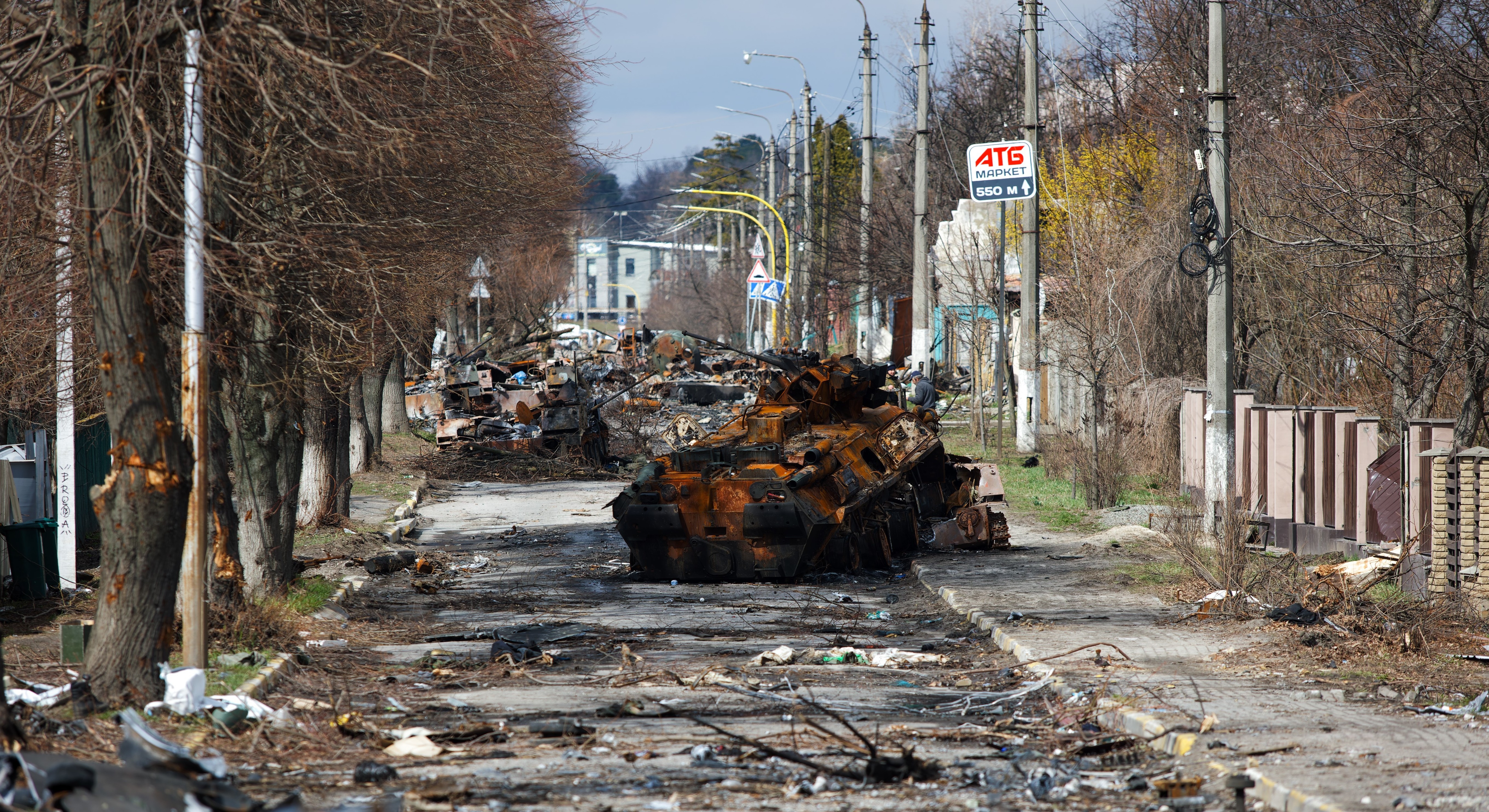 The devastation on Bucha's Vokzal'na Street in early April, just after the Russian troops left. The photo below shows the cleaned up street on Monday. (Dmytro Larin / Ukrainska Pravda)