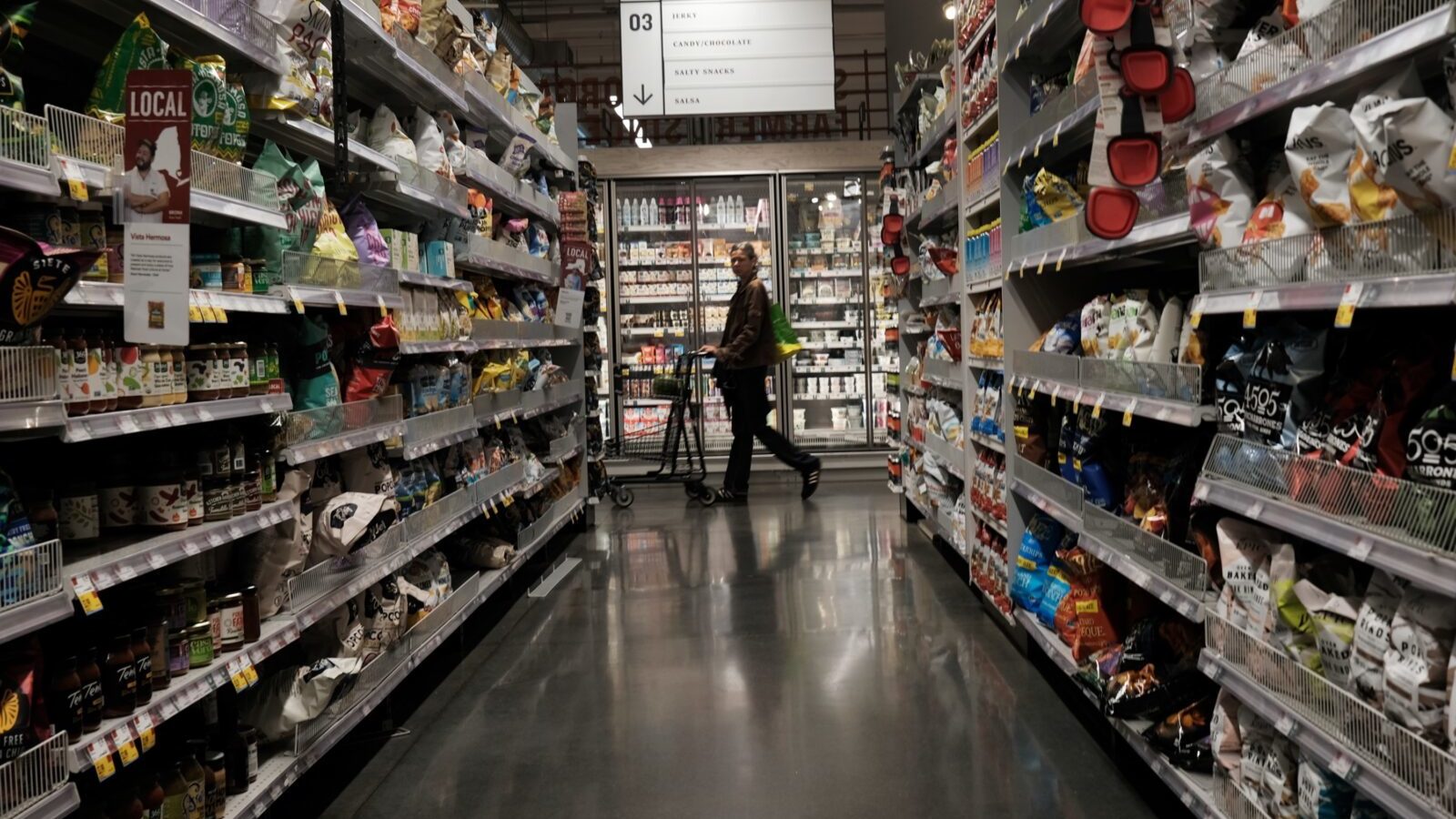 People shop at a grocery store in New York City. (Getty Images)