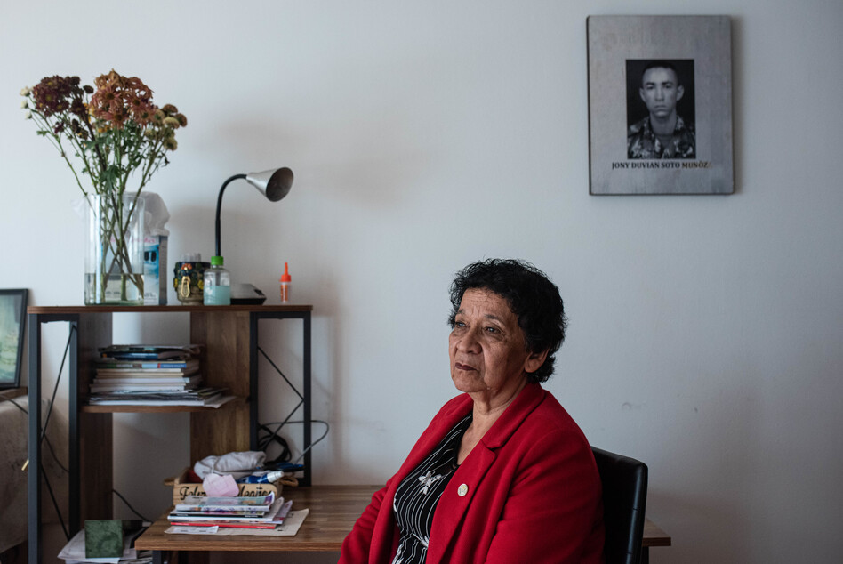 Zoraida Muñoz is part of a group of mothers denouncing extrajudicial killings known as 'false positives.' The mothers say their sons were kidnapped by the Colombian army, killed and disguised as guerrillas to add to a fictitious war record. The mother of Jonny Duvián, who was killed in 2008, Muñoz spoke at the hearing in Ocaña. Here she is photographed at her home in Bogotá, Colombia, on May 18.