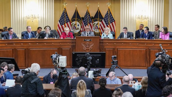 Committee members sit on the dais as the House select committee investigating the Jan. 6 attack on the U.S. Capitol continues on June 13.