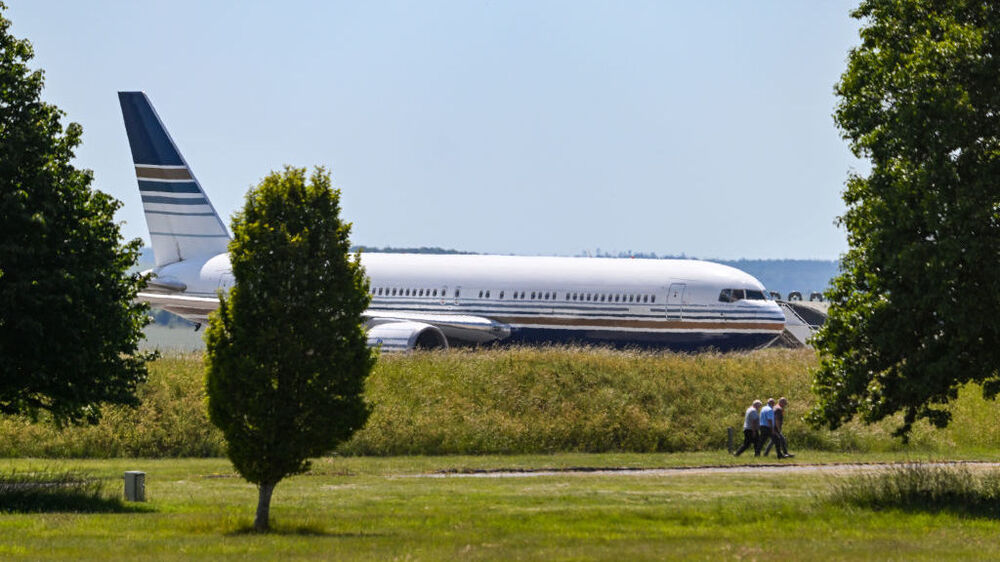 A flight scheduled to take asylum-seekers, regardless of their nationality, to Rwanda awaits its passengers Tuesday at Boscombe Down Air Base, 80 miles east of London. The flight was halted by a court injunction. (Getty Images)