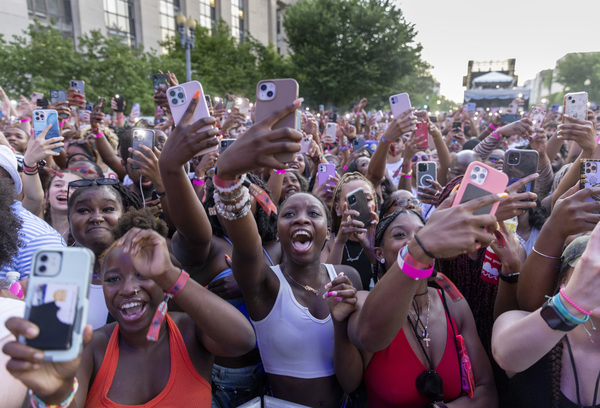 Crowds scream and raise their phones as Moneybagg Yo takes the stage on Friday, June 17.