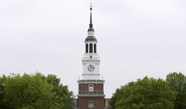 In this May 22, 2018 file photo, the spire of the Baker-Berry Library stands above The Green at Dartmouth College in Hanover, New Hampshire.