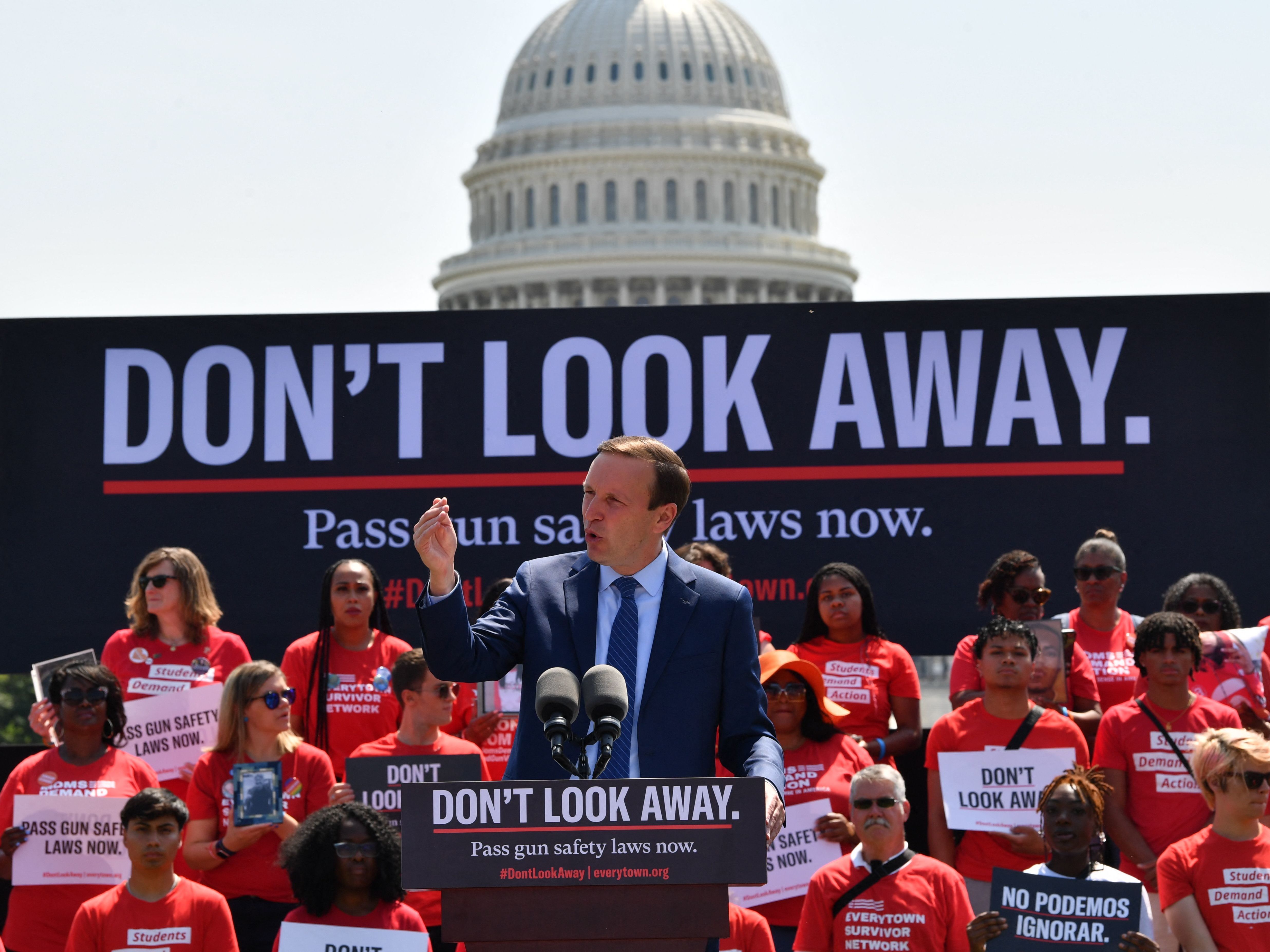 Sen. Chris Murphy of Connecticut, the lead Democratic negotiator on a bipartisan gun bill safety bill, speaks to activists protesting gun violence and demanding action from lawmakers, on June 8 near the U.S. Capitol. (AFP via Getty Images)