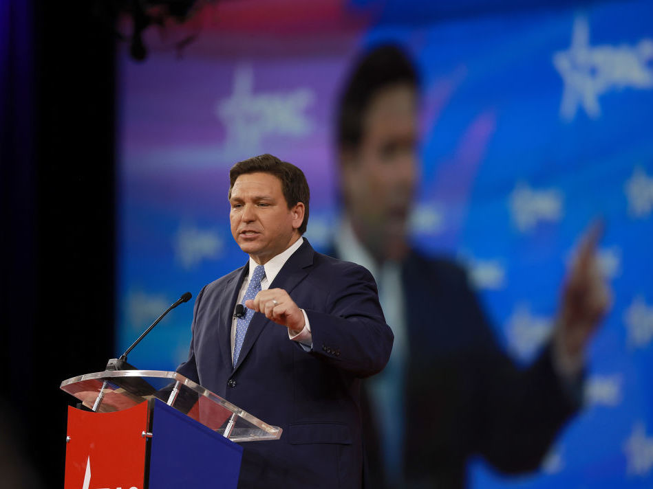 Florida Gov. Ron DeSantis speaks at the Conservative Political Action Conference in February. DeSantis signed a law last week aimed in part at limiting the number of migrant children flown into the state. (Getty Images)