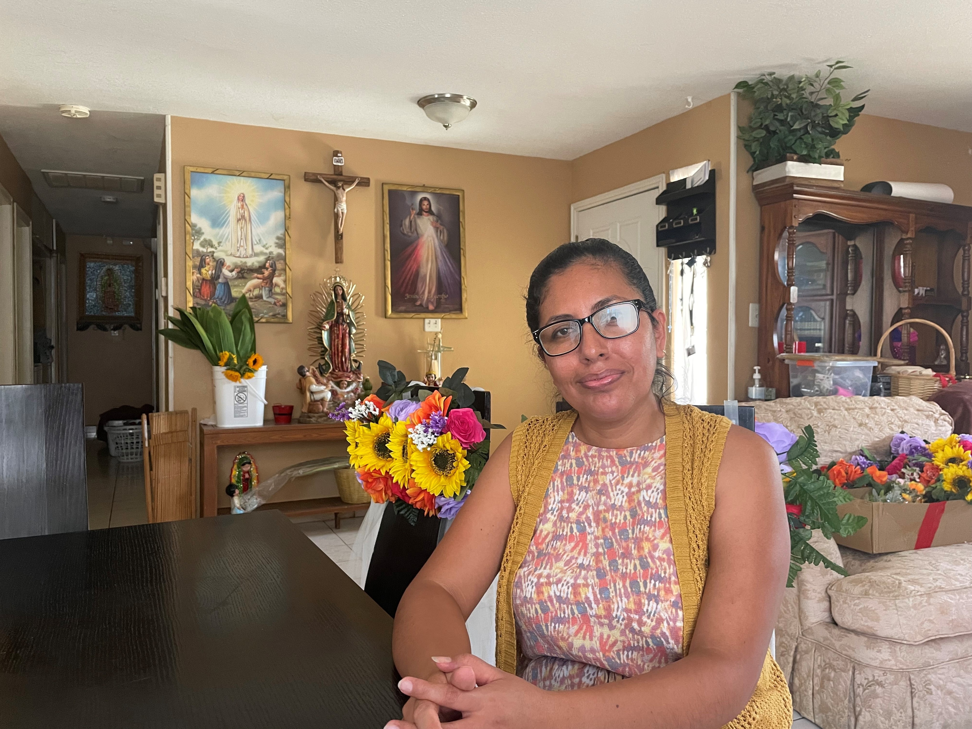 Minerva Contreras, 44, connects climate change to her health because she has a lung problem that makes it harder to breathe on hot days. Keeping her house near Bakersfield, Calif., cool costs as much as $800 a month in the summer. (KVPR)