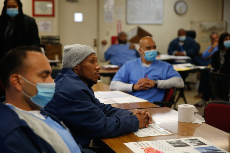 Yusef Pierce (center) in Pitzer College class in prison. For the last quarter-century, there has been a ban on people in prison using federal money to pay for college classes. Pitzer's program is privately funded.