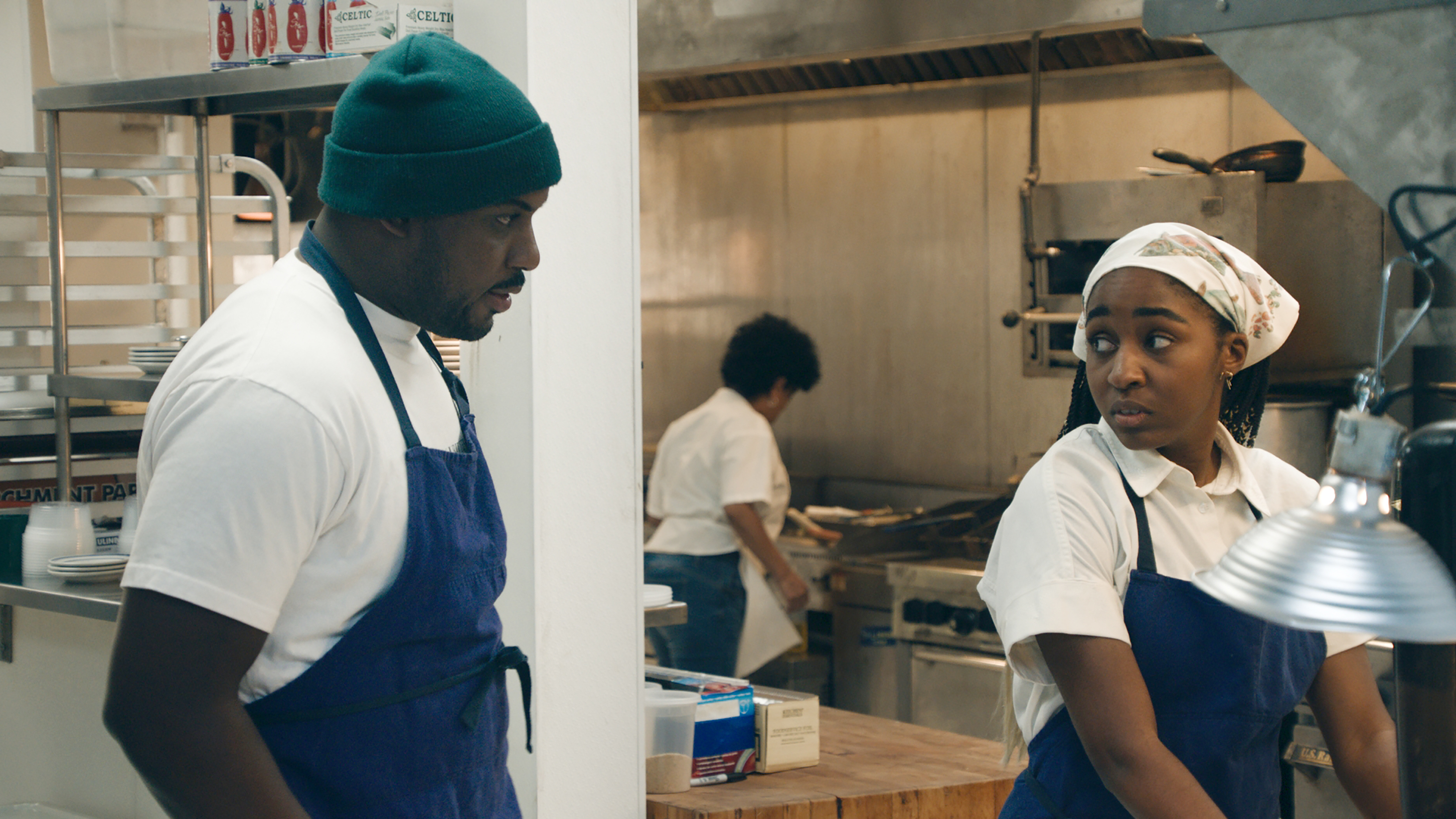 Lionel Boyce as Marcus and Ayo Edebiri as Sydney on the new FX show The Bear. 