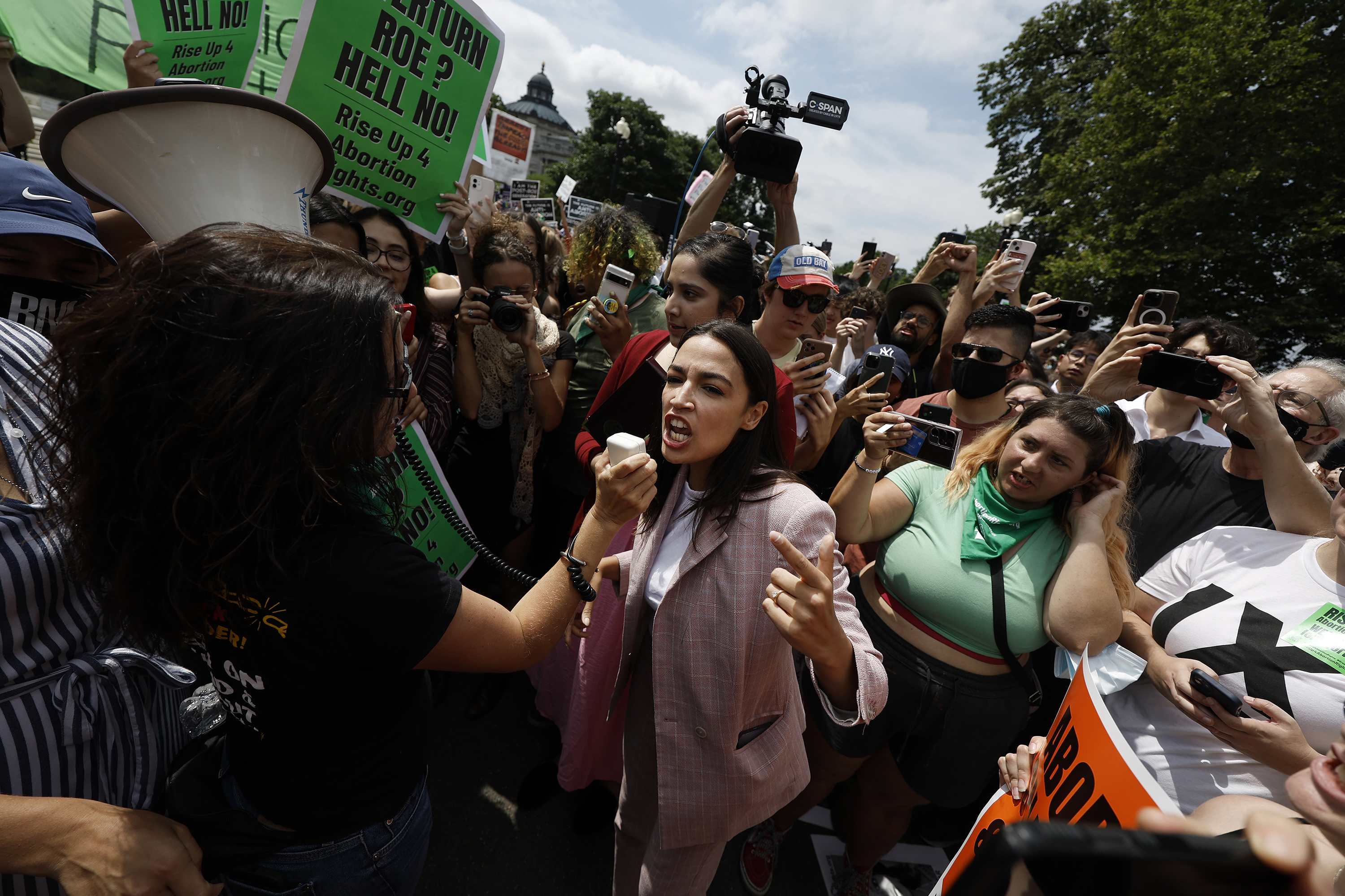 Rep. Alexandria Ocasio-Cortez, D-N.Y., speaks to abortion rights activists following the Dobbs v. Jackson Women's Health Organization ruling, in D.C. on Friday.