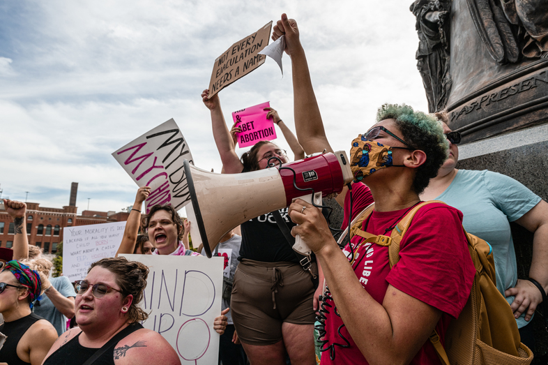 Abortion rights protesters in Louisville, Ky., after the Supreme Court announced it had voted to overturn <em>Roe v. Wade</em>. On Monday, abortion rights advocates filed a lawsuit arguing that the Kentucky state constitution protects the right to abortion. (Jon Cherry/Getty Images)