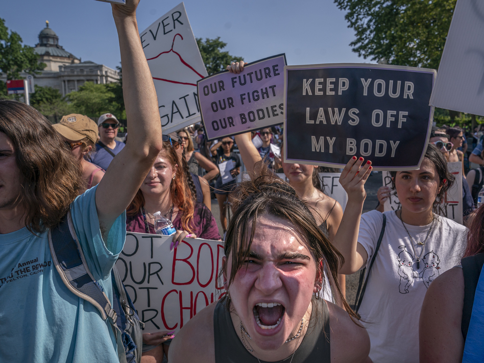 Abortion-rights activists argue with anti-abortion activists in front of the Supreme Court on Sunday in Washington, D.C.