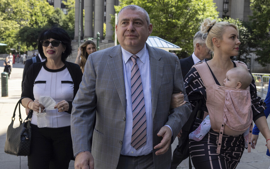 Lev Parnas, a former associate of Rudy Giuliani, arrives at the federal courthouse in New York with his wife Svetlana Parnas on Wednesday.