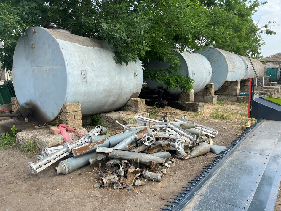 A pile of rockets and shells that Mykhailo Liubchenko says he removed from his field. A former colonel in the Soviet army, Liubchenko says he spent part of his military career demining. He calls today's Russian forces 'the barbarians of the 21st century.'