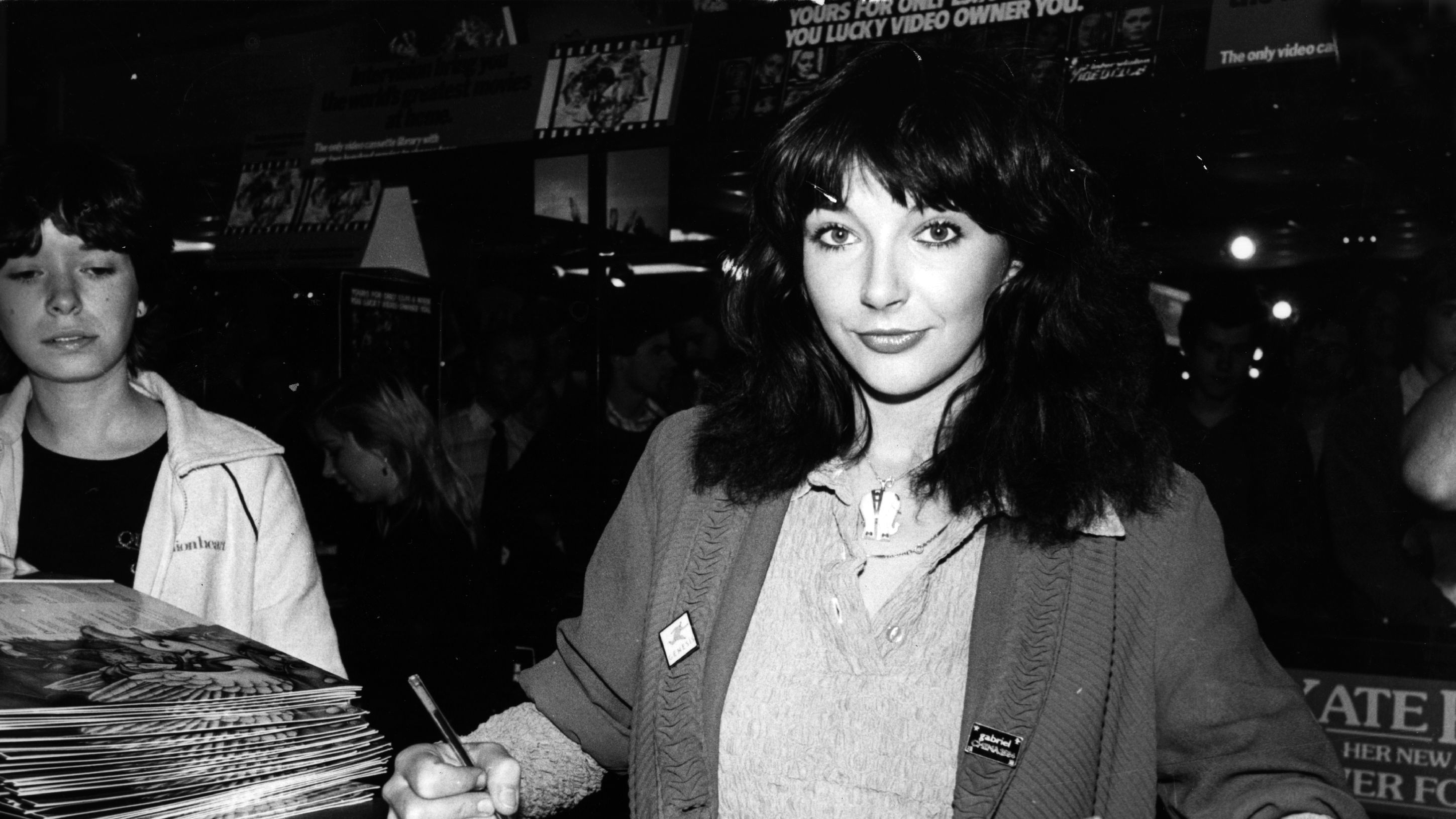 Kate Bush signing records in 1980.