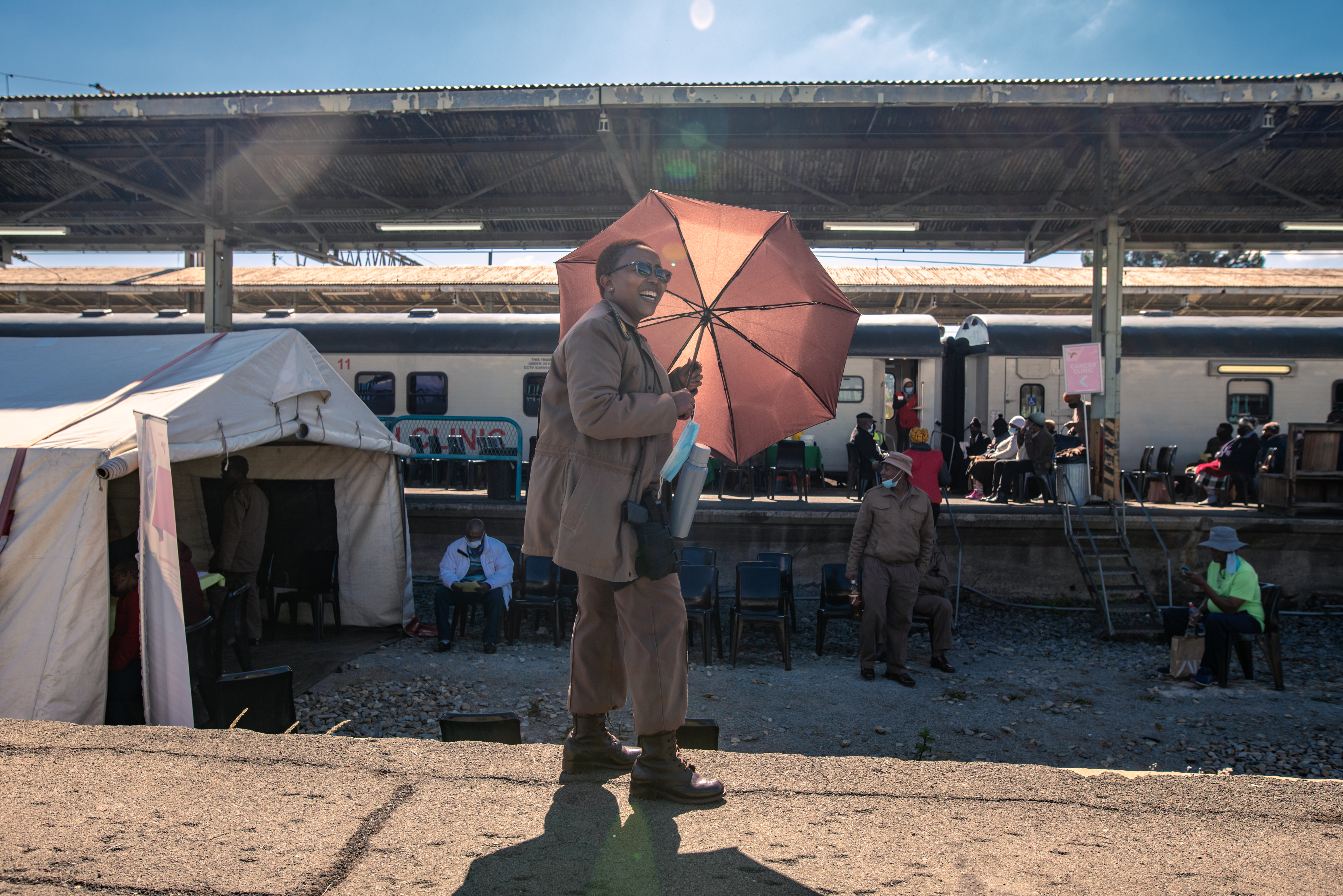 PHOTOS: South Africa's 'train of hope' is a godsend for millions. But new threats loom 3 Corrections officer Sesi Motsoaleli watches over a group of prisoners who have been brought to the Phelophepa health-care train during a stop in Kroonstad, South Africa, for various medical procedures and checks. The prison sends its inmates here whenever the train is in town.