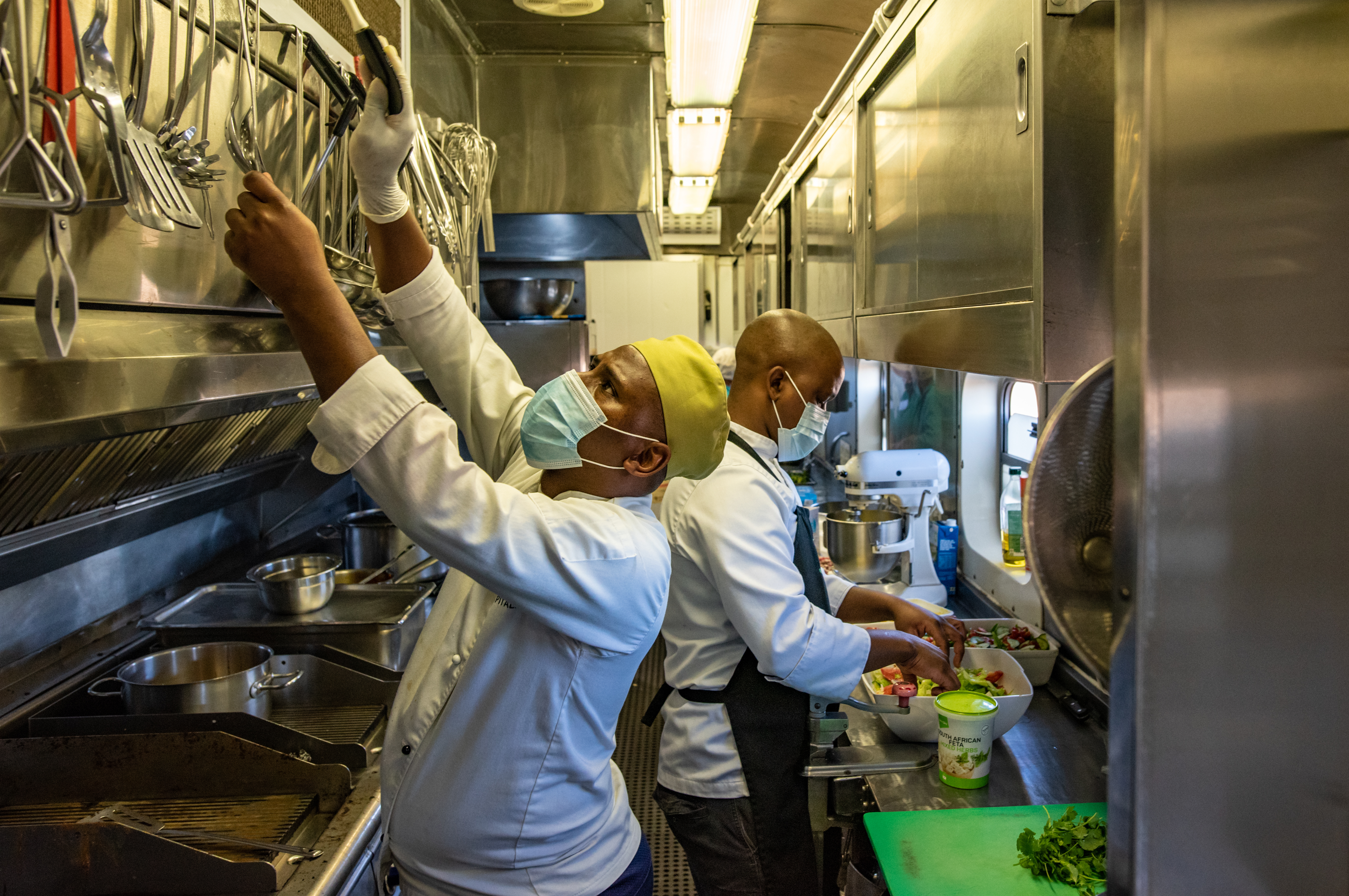 PHOTOS: South Africa's 'train of hope' is a godsend for millions. But new threats loom 6 Chef Nangamso Gwiliza reaches for a utensil in the kitchen of the Phelophepa medical train. Operating out of a tiny space in carriage No. 5, Gwiliza and his team cook over 100,000 meals per year for the train's staff and contractors.