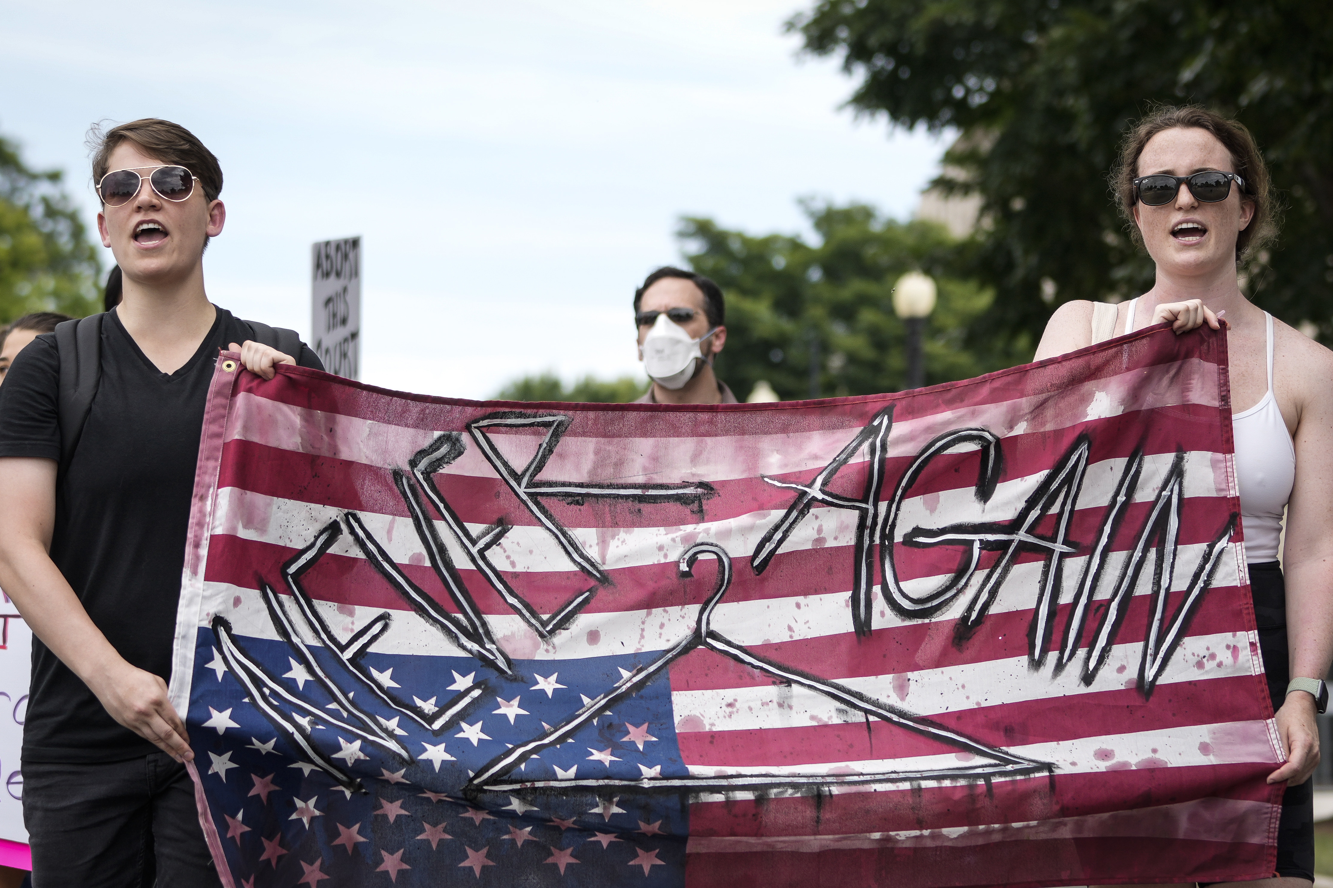 Abortion rights activists march from the Supreme Court to the House of Representatives office buildings on Wednesday. (Getty Images)