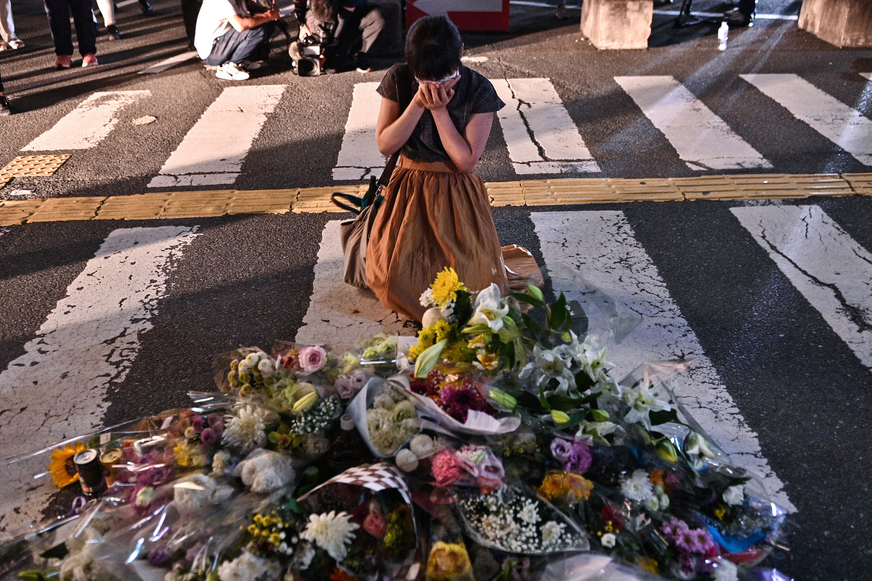 Japan's former Prime Minister Shinzo Abe was killed. Here's what the scene was like 7 A woman reacts in front of a makeshift memorial outside Yamato-Saidaiji Station in Nara, a city in western Japan, where former Japanese Prime Minister Shinzo Abe was shot and killed while speaking at a political event Friday.