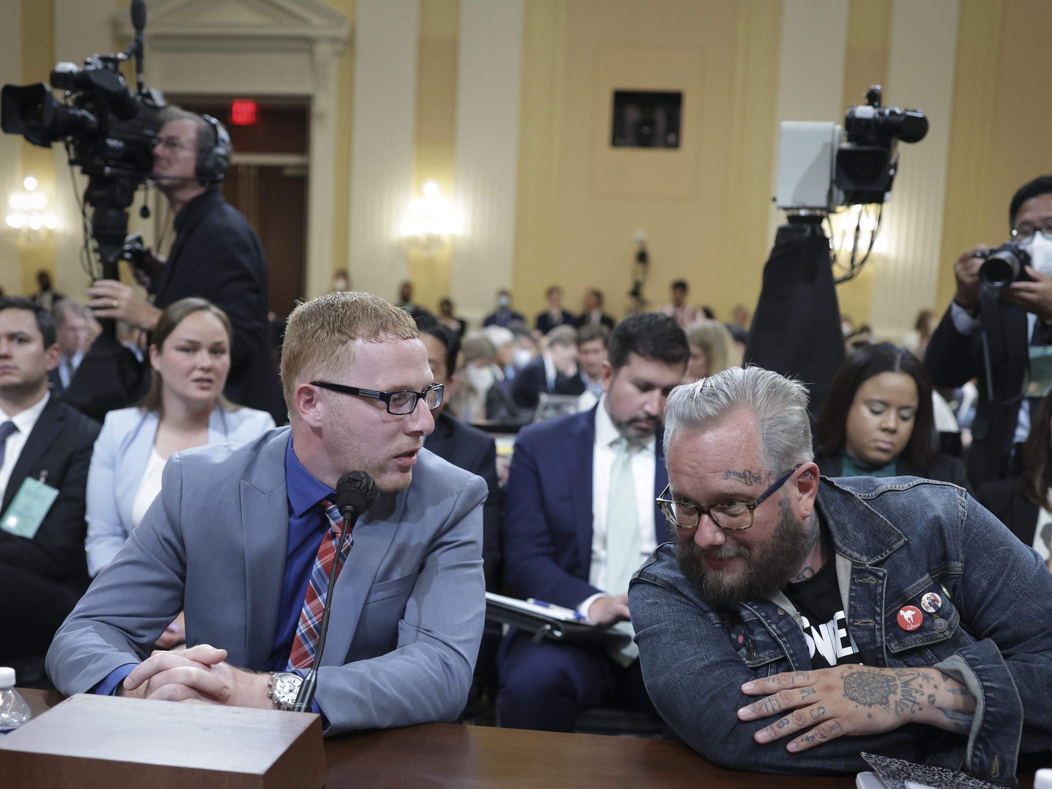 Stephen Ayres (L), who entered the U.S. Capitol illegally on January 6, 2021, confers with Jason Van Tatenhove (R), who served as national spokesman for the Oath Keepers and as a close aide to Oath Keepers founder Stewart Rhodes, prior to their testimony during the seventh hearing by the House Select Committee to Investigate the January 6th Attack on the U.S. Capitol on Tuesday afternoon. (Getty Images)