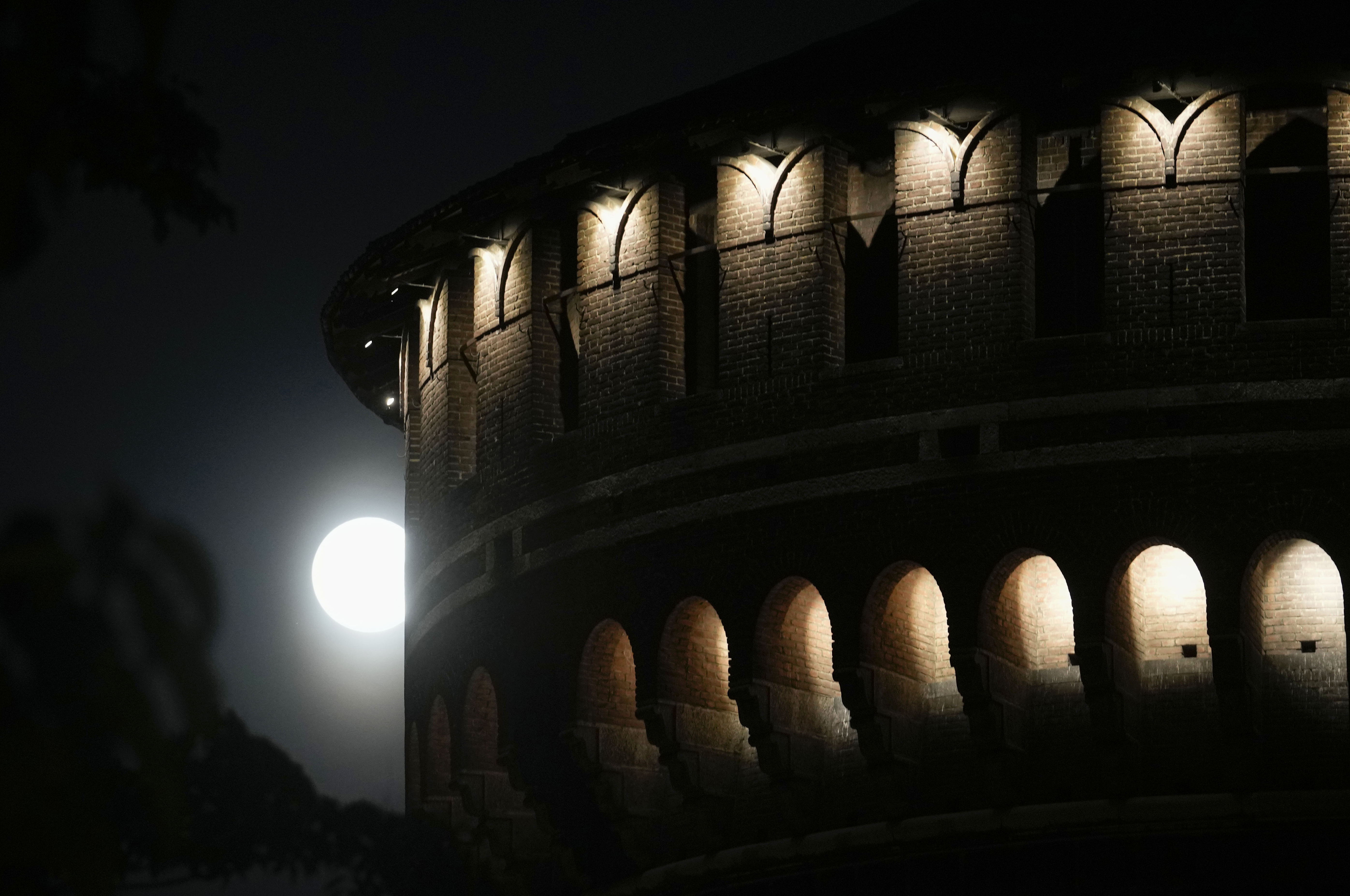A buck supermoon rose on Wednesday. Here's what it looked like around the world 12 Milan, Italy: The full moon rises over the Sforzesco Castle.