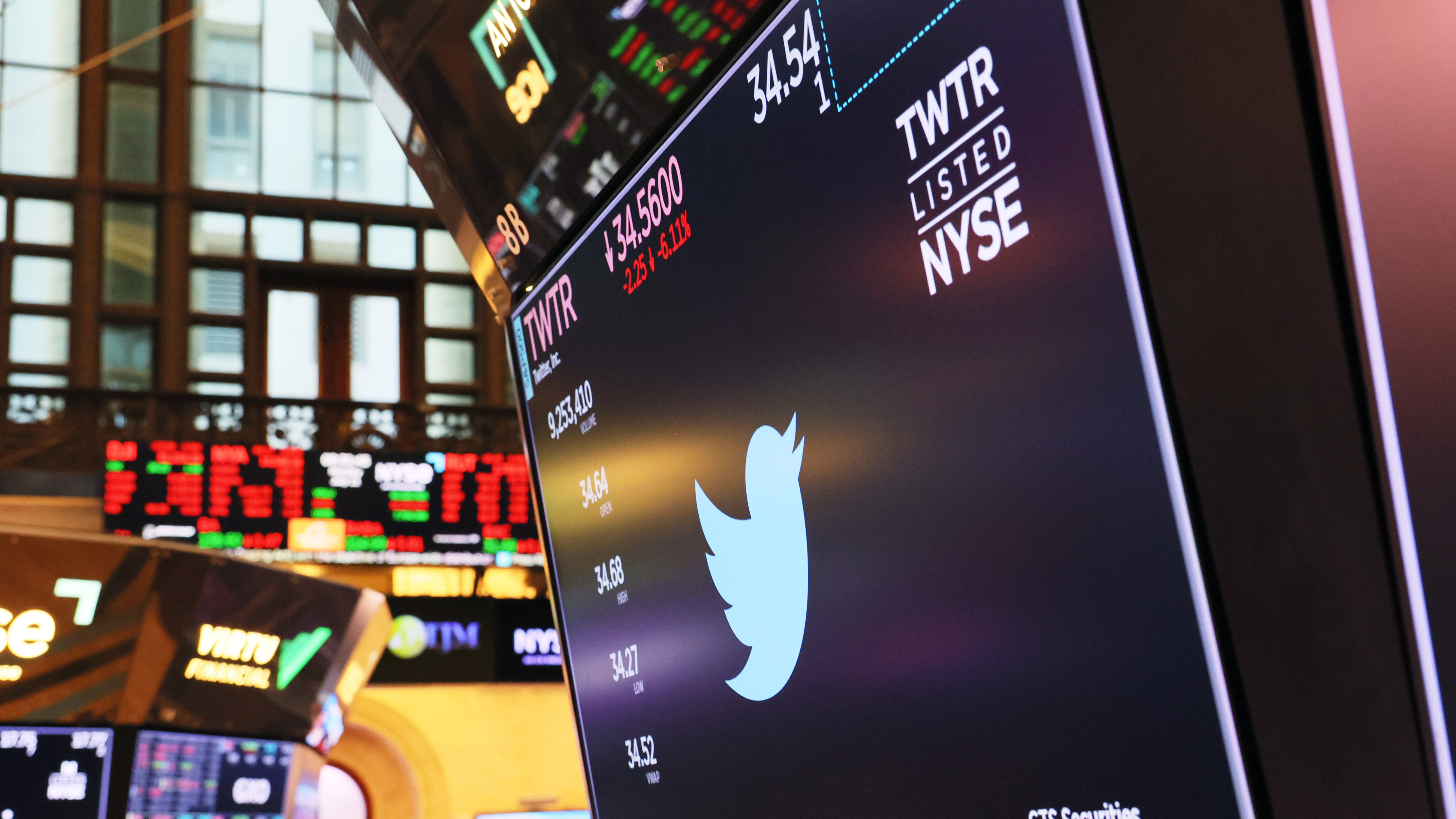 A Twitter logo is displayed on a screen at the New York Stock Exchange in early July.