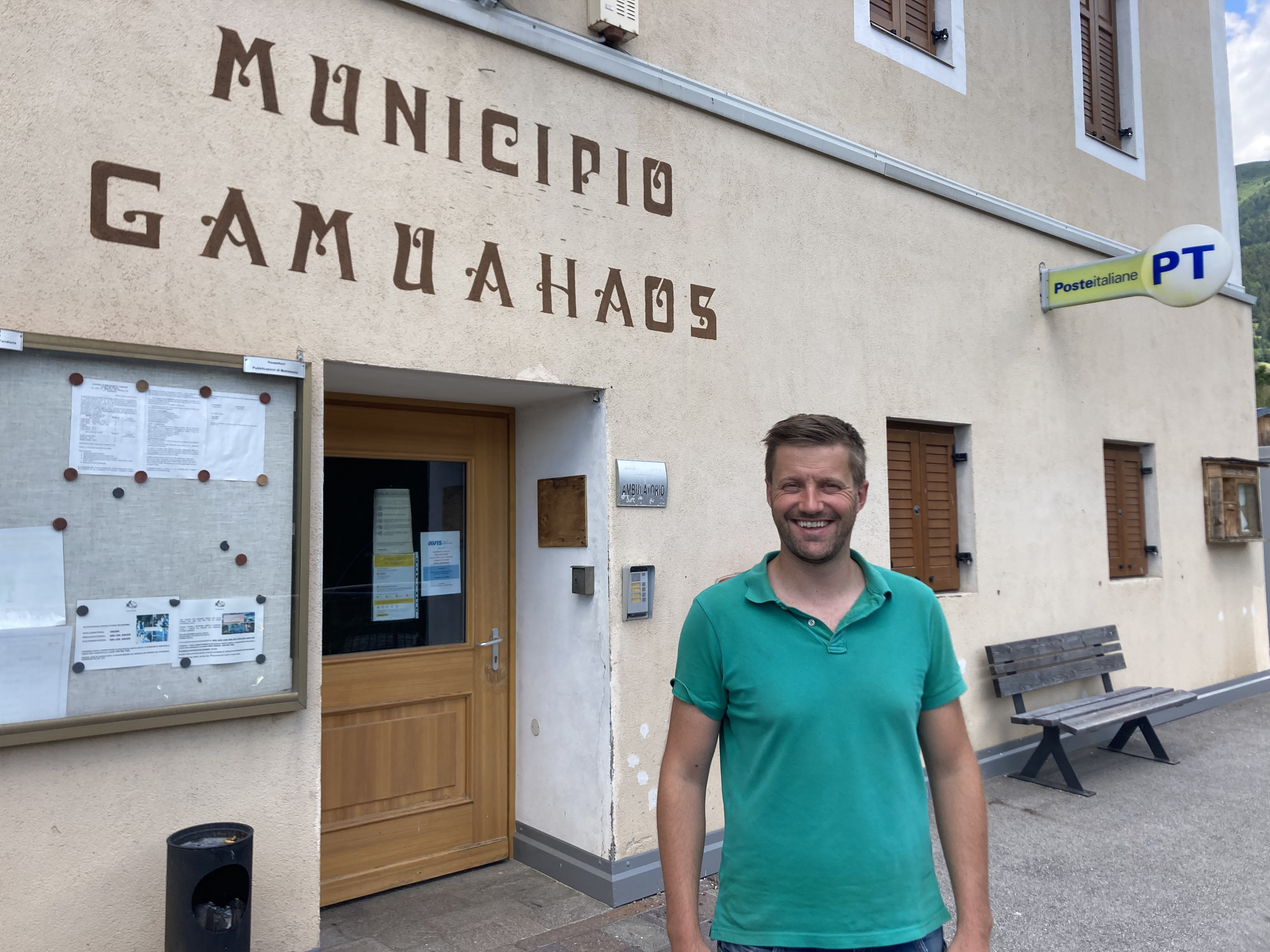 Palù del Fersina's Mayor Franco Moar stands outside the town hall. The northern Italian village of 160 people is one of 21 villages across Italy that has been granted $20 million to combat population loss and boost the local economy. Palù del Fersina is one of three villages in the northern Trentino region where locals speak the Mòcheno language. (NPR)