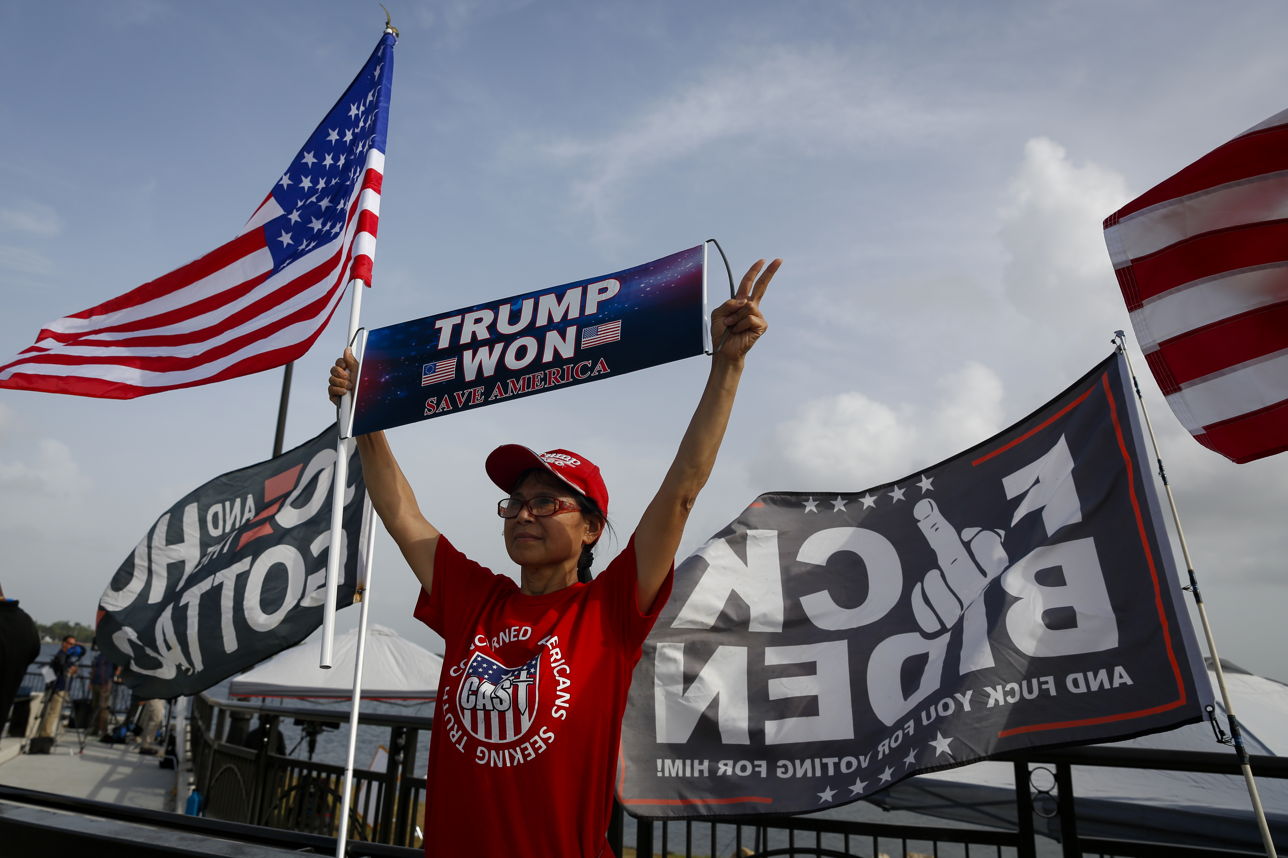 Supporters of former US President Donald Trump outside Mar-A-Lago in Palm Beach, Florida, US, on Tuesday, Aug. 9, 2022. Donald Trump faces intensifying legal and political pressure after FBI agents searched his Florida home in a probe of whether he took classified documents from the White House when he left office, casting a shadow on his possible run for the presidency in 2024. (Bloomberg via Getty Images)