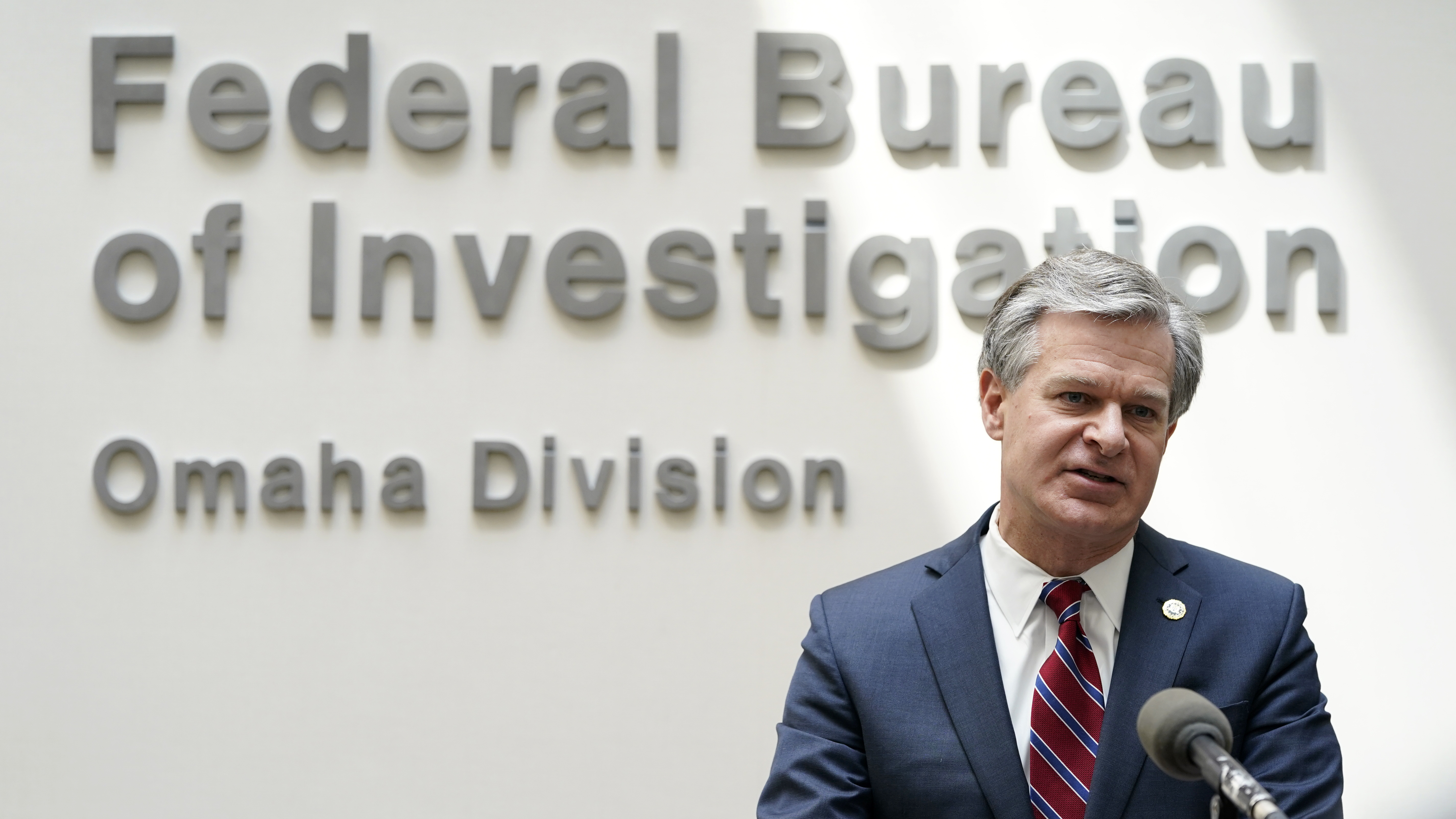 FBI Director Christopher Wray speaks during a news conference Wednesday in Omaha, Neb.