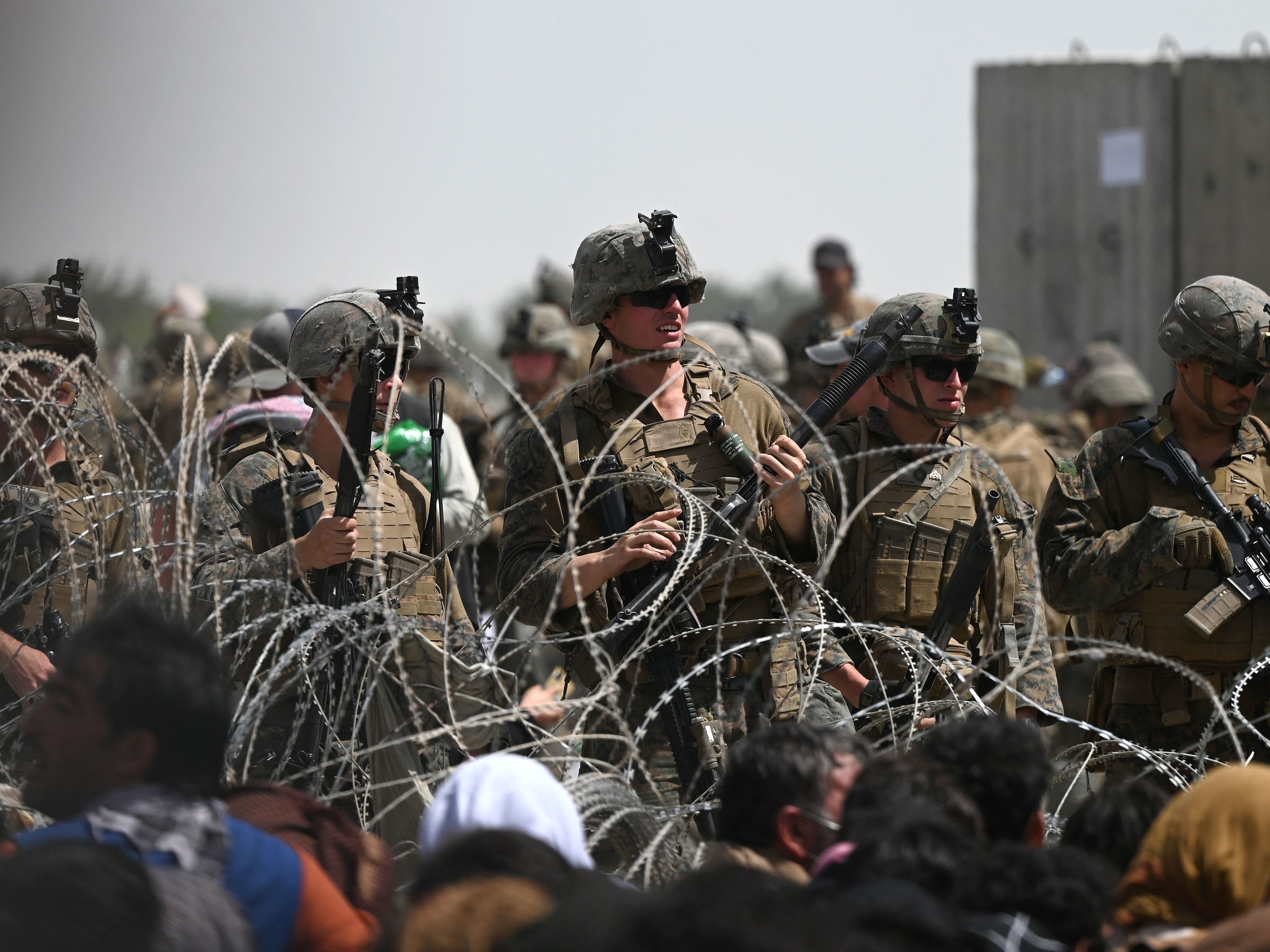 The Kabul airport was a chaotic mess in the weeks leading up the U.S. withdrawal from Afghanistan as Afghans tried to flee the country. (AFP via Getty Images)