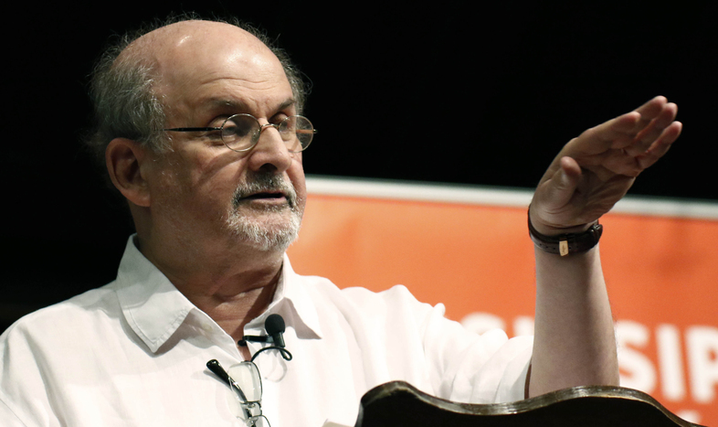 Author Salman Rushdie, pictured in 2018, is expected to survive a stabbing attack, his agent says. (Rogelio V. Solis/AP)