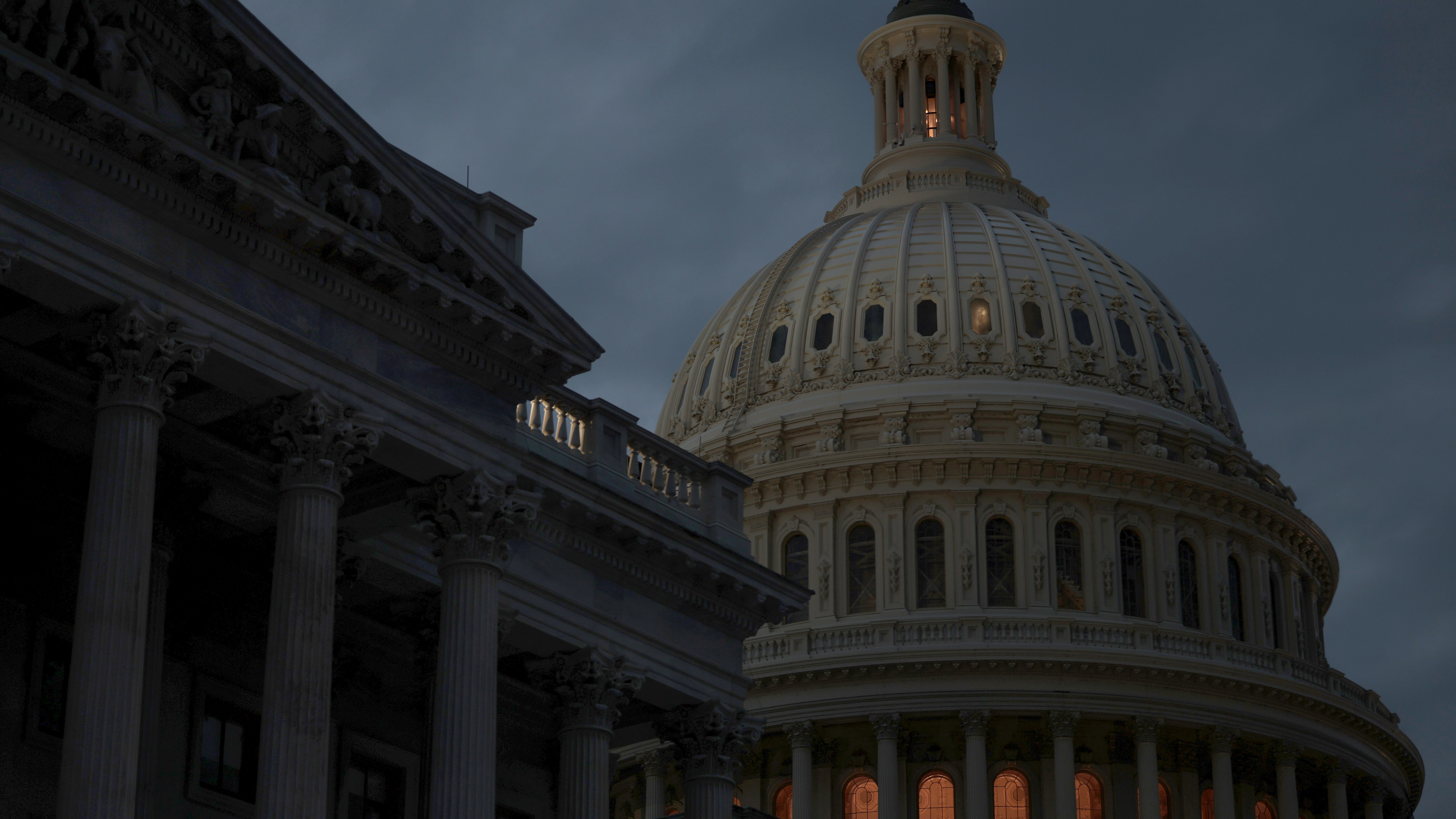 Police investigate an incident with a car crash and gunfire near the U.S. Capitol