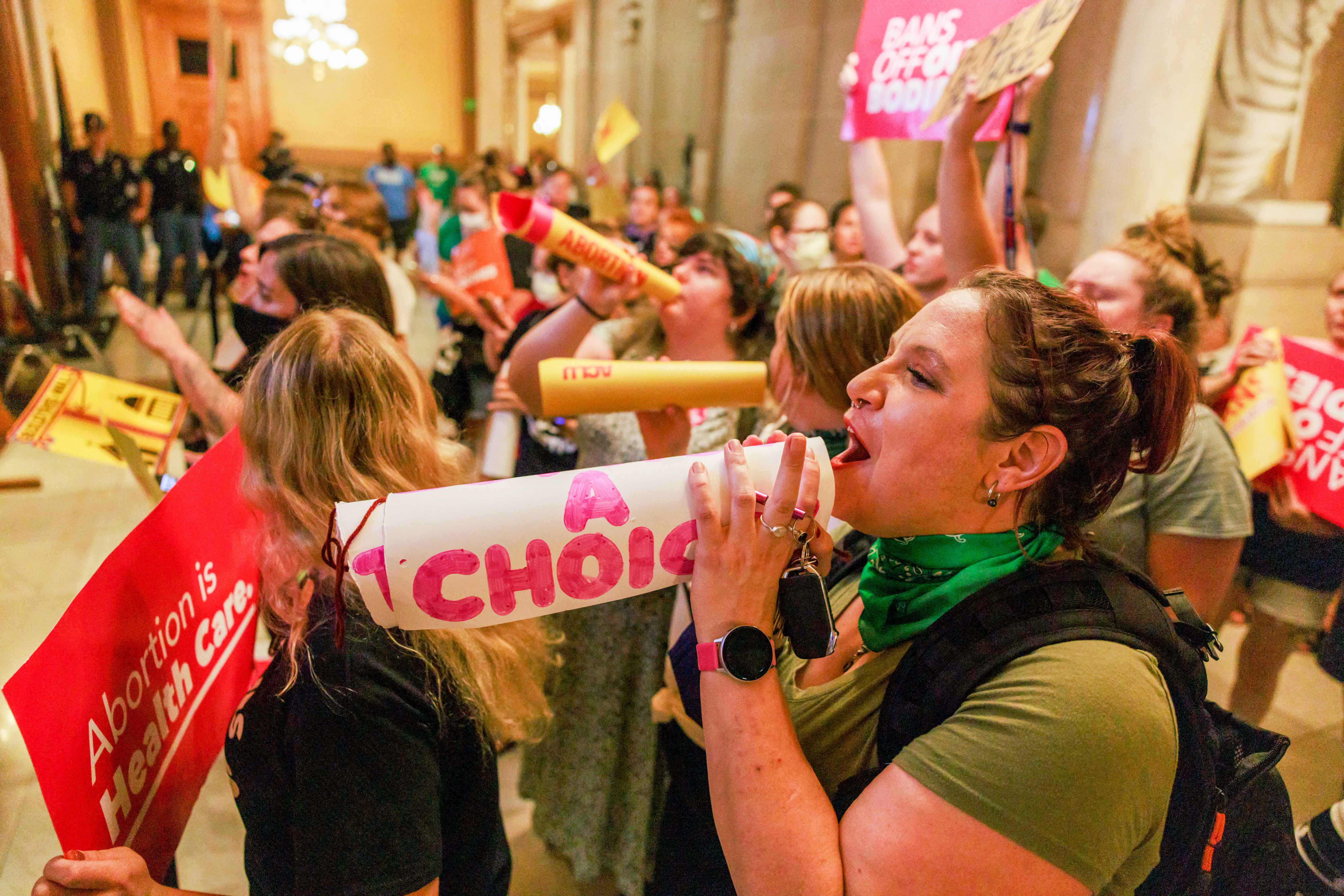 Abortion rights activists chant slogans as the Indiana Senate debates during a special session in Indianapolis before voting to ban abortions. (SOPA Images/LightRocket via Gett)