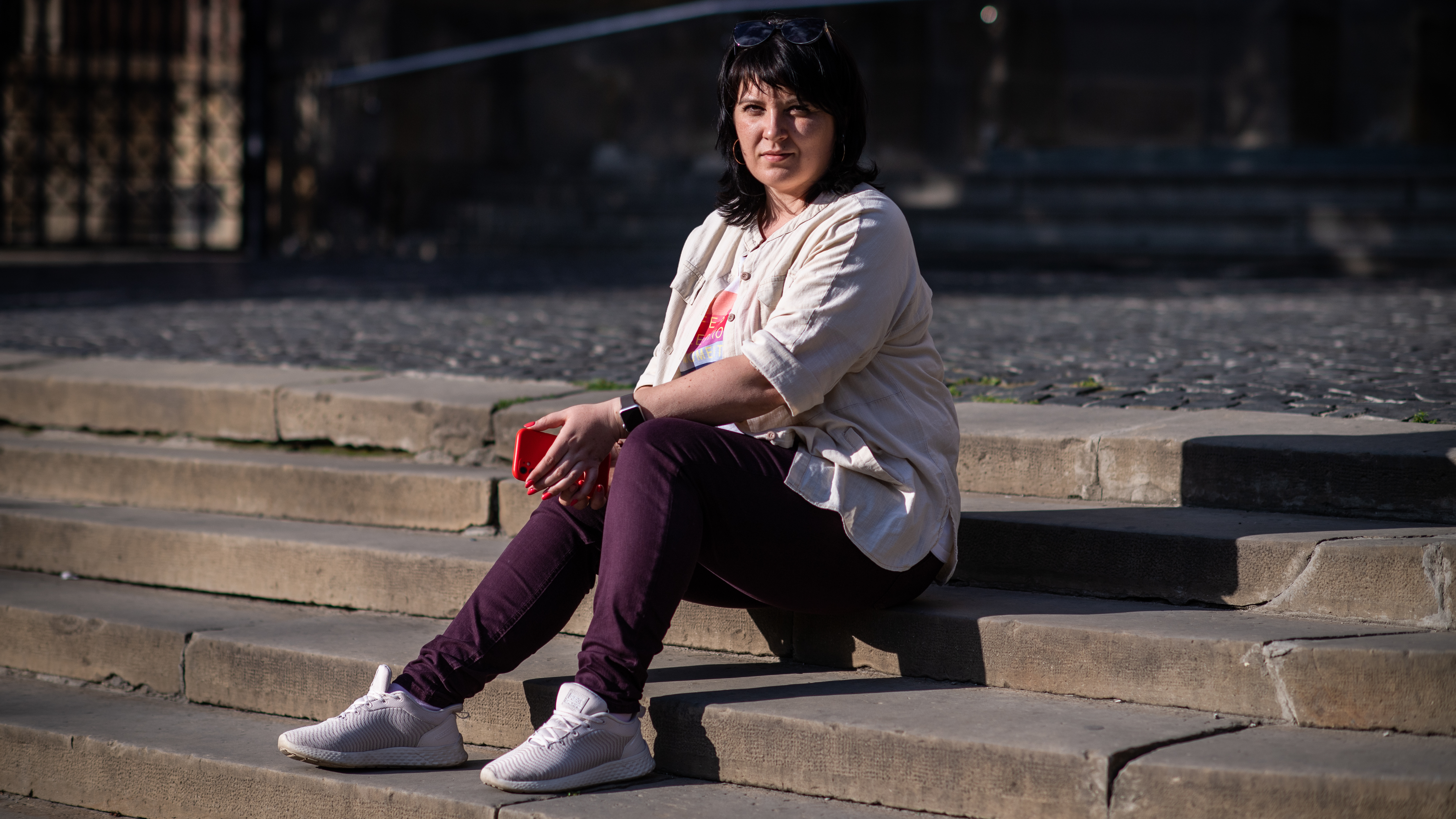 Olha Kerod, the wife of a Ukrainian soldier who was captured by Russian forces in Mariupol, poses in front of the Church of Sts. Olha and Elizabeth, where she often prays, in Lviv, Ukraine, on July 18. "I pray for all the soldiers, not just Stas," her husband, she says. "I will keep praying until they all come home."