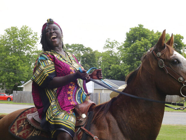 Brittany Martin, founder of Mixed Sistaz United, rides a horse at the organization's inaugural Juneteenth celebration in 2021 in Sumter, S.C.
