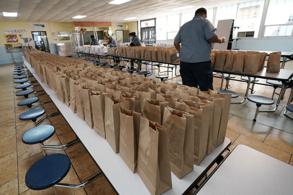 Jefferson County School District Food Service Department staff arrange some of the hundreds of free lunches that was given to students on March 3, 2021 in Fayette, Miss. As one of the most food insecure counties in the United States, many families and their children come to depend on the free meals as their only means of daily sustenance.