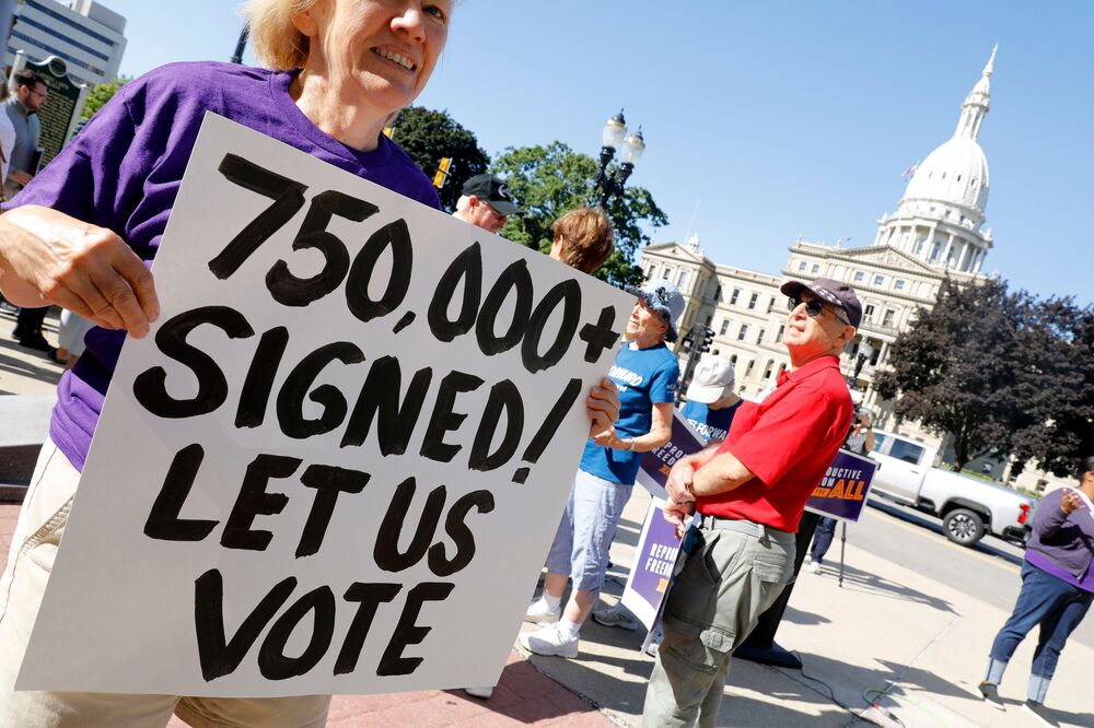 Abortion rights supporters gather outside the Michigan Capitol in Lansing, Mich., during a rally on September 7, 2022. (AFP via Getty Images)