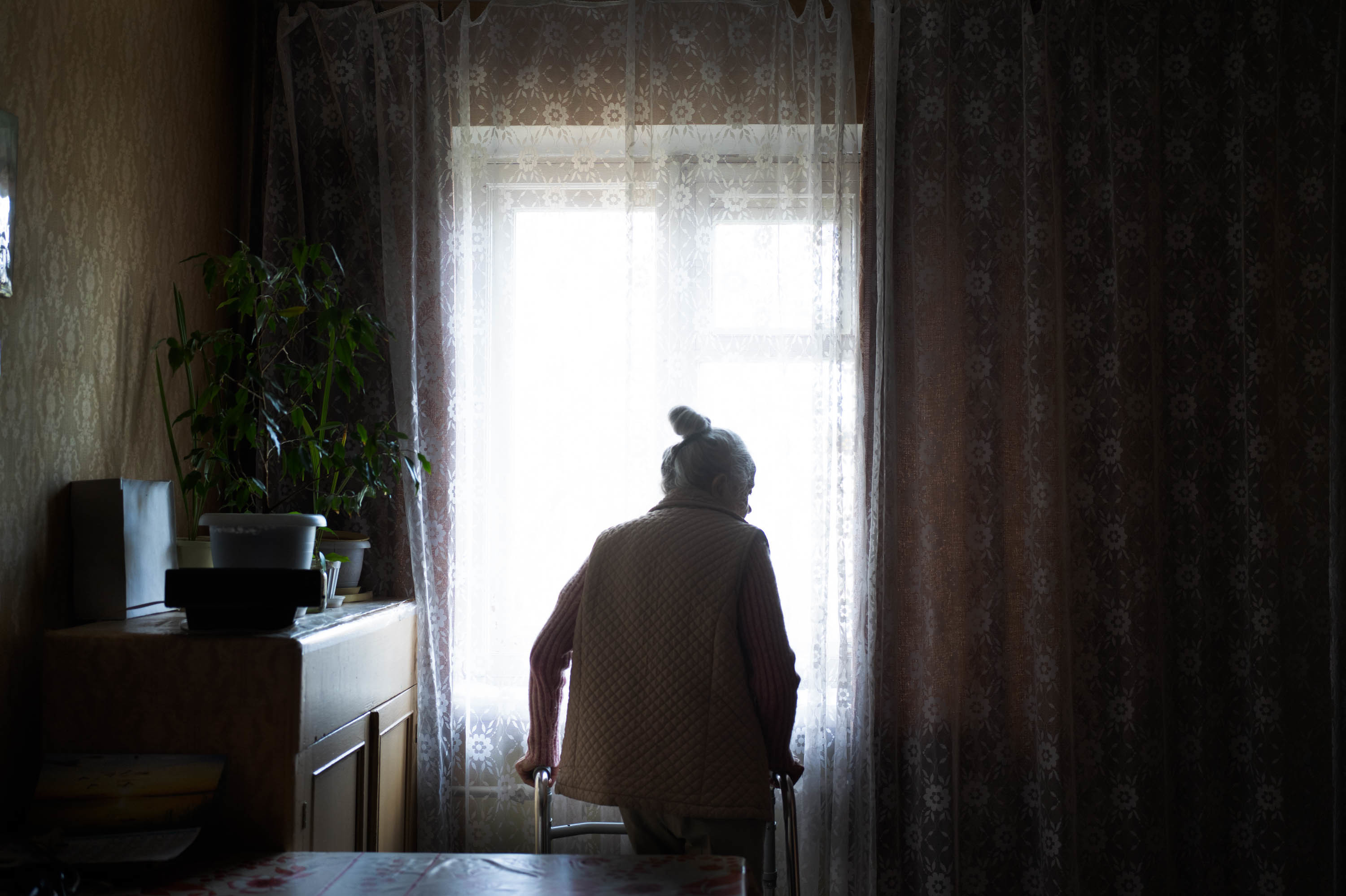 Larisa, 76, lives alone in her apartment in Sloviansk, Ukraine. She hasn't been outside since before the war. (NPR)