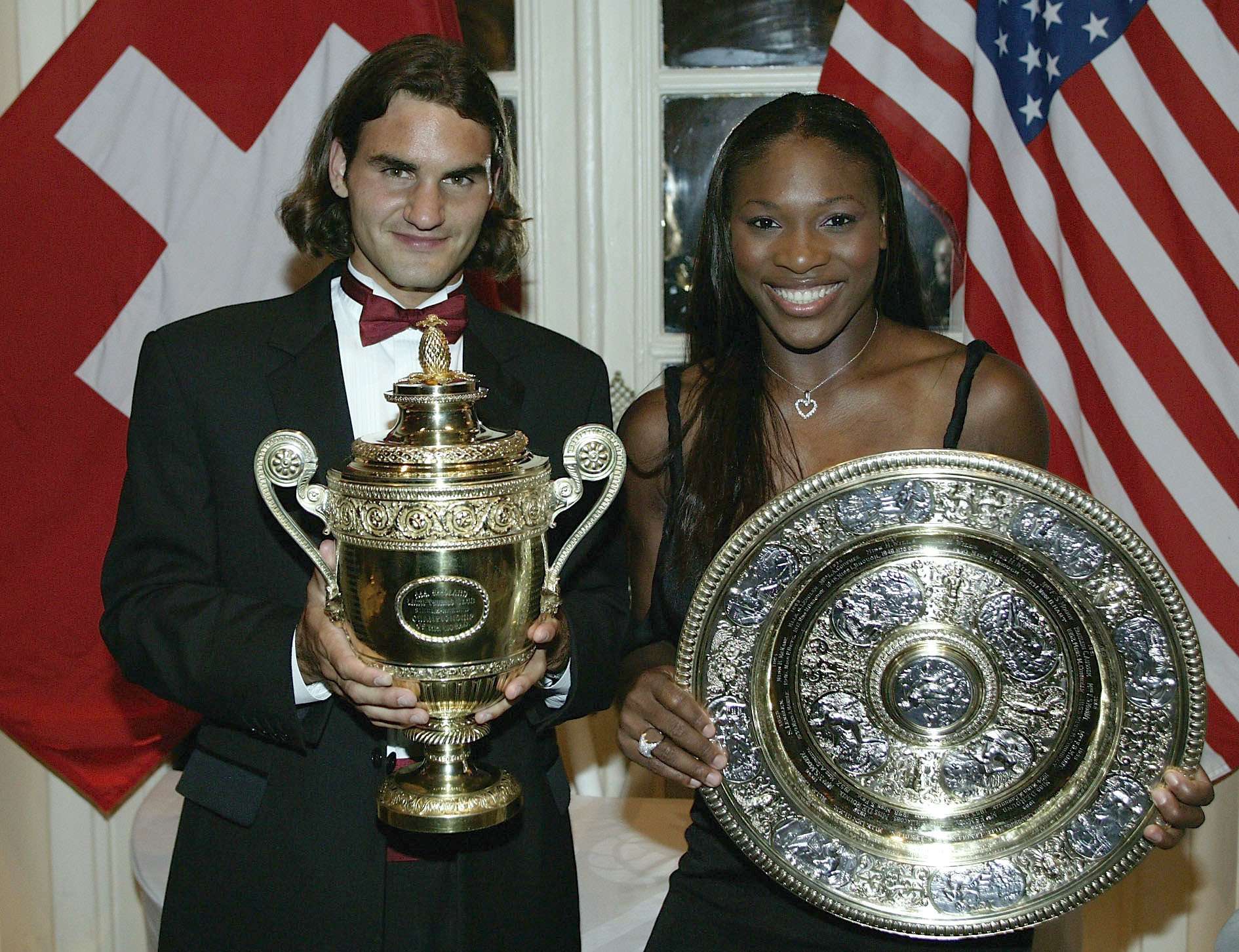 July 6, 2003: Wimbledon Champions Roger Federer of Switzerland and Serena Williams of the U.S. pose for photographs prior to attending the Wimbledon Ball at the Savoy Hotel in London.